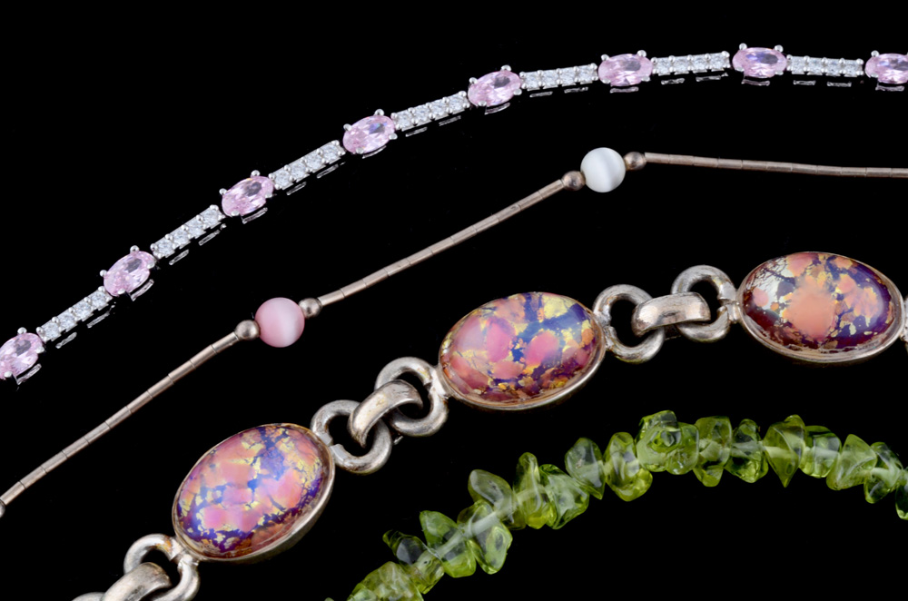 Seven Sterling Silver Bracelets Including Peridot and Pearls