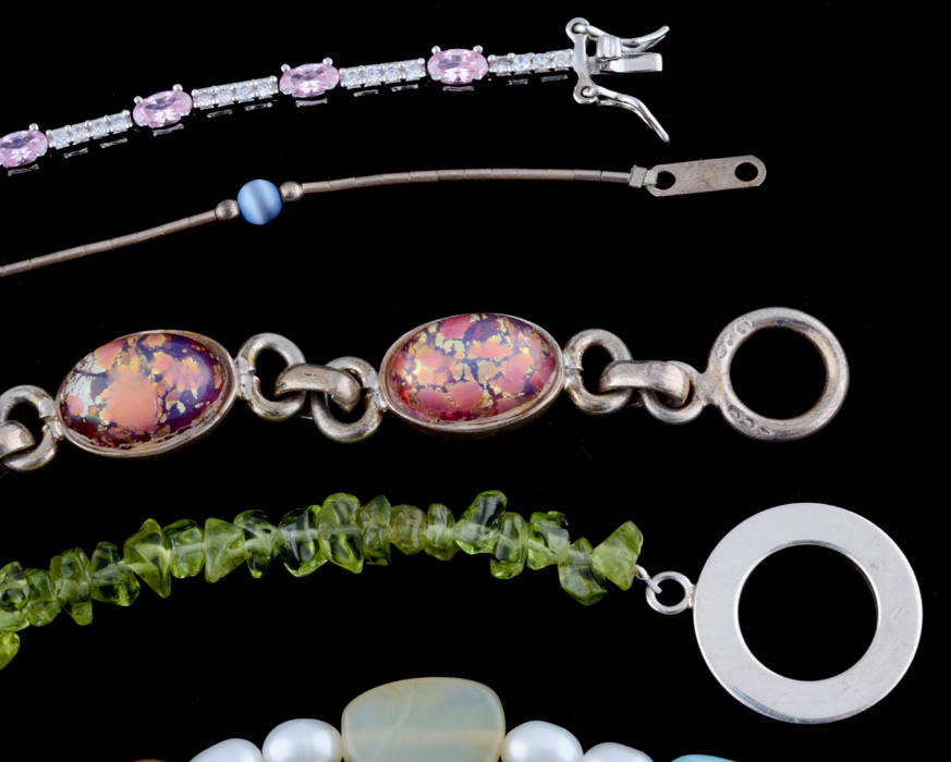 Seven Sterling Silver Bracelets Including Peridot and Pearls
