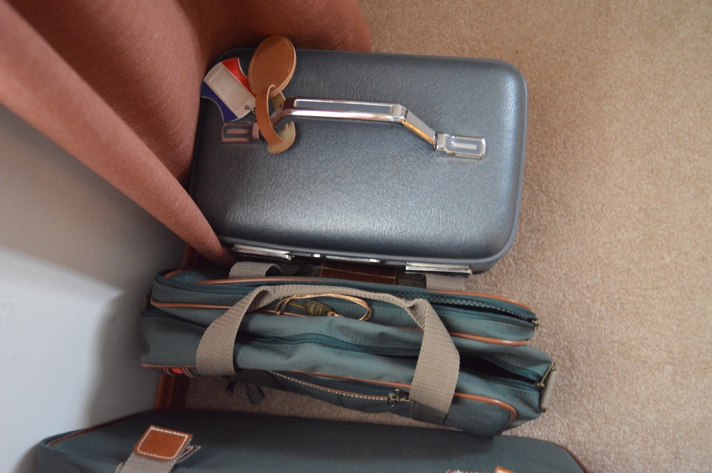 Luggage and Bowling Bowl