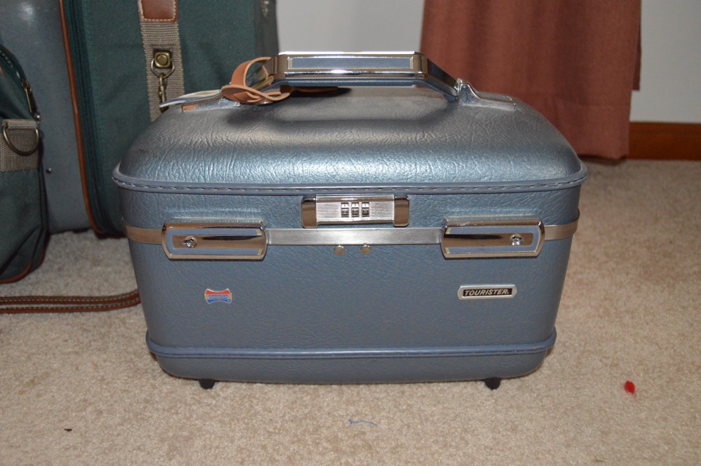 Luggage and Bowling Bowl