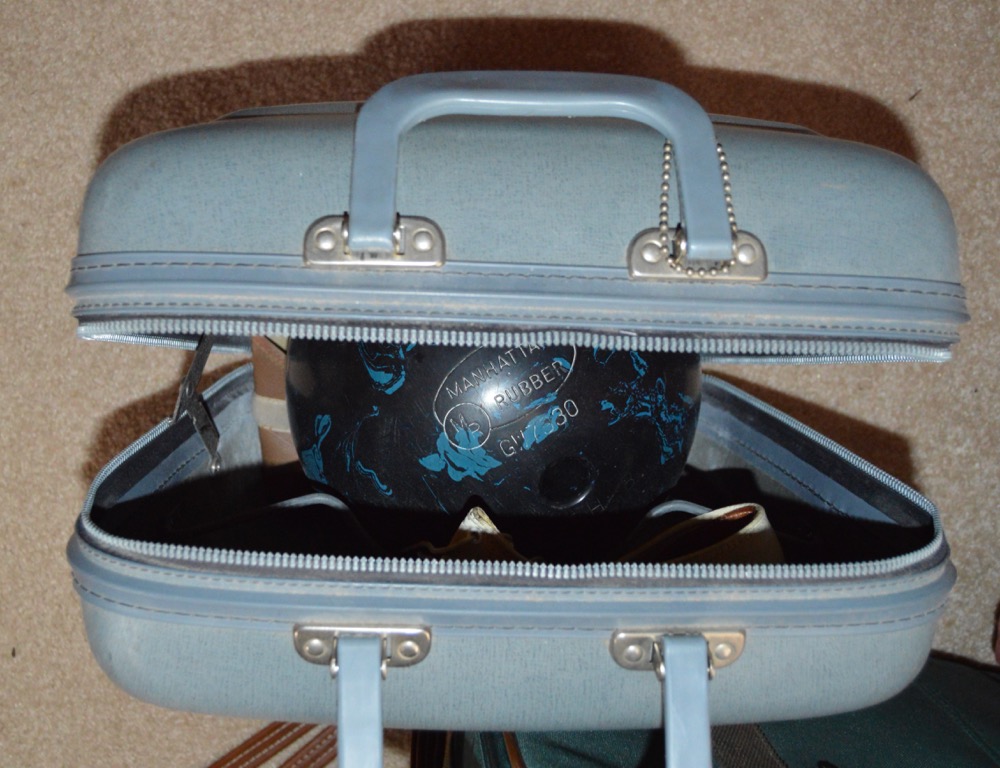 Luggage and Bowling Bowl