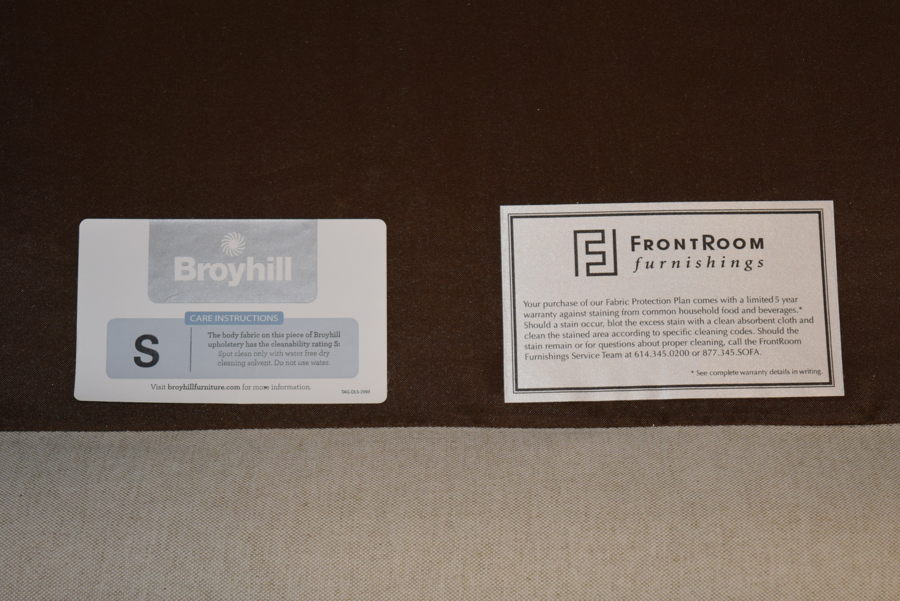 Broyhill Ivory Sofa with Accent Pillows