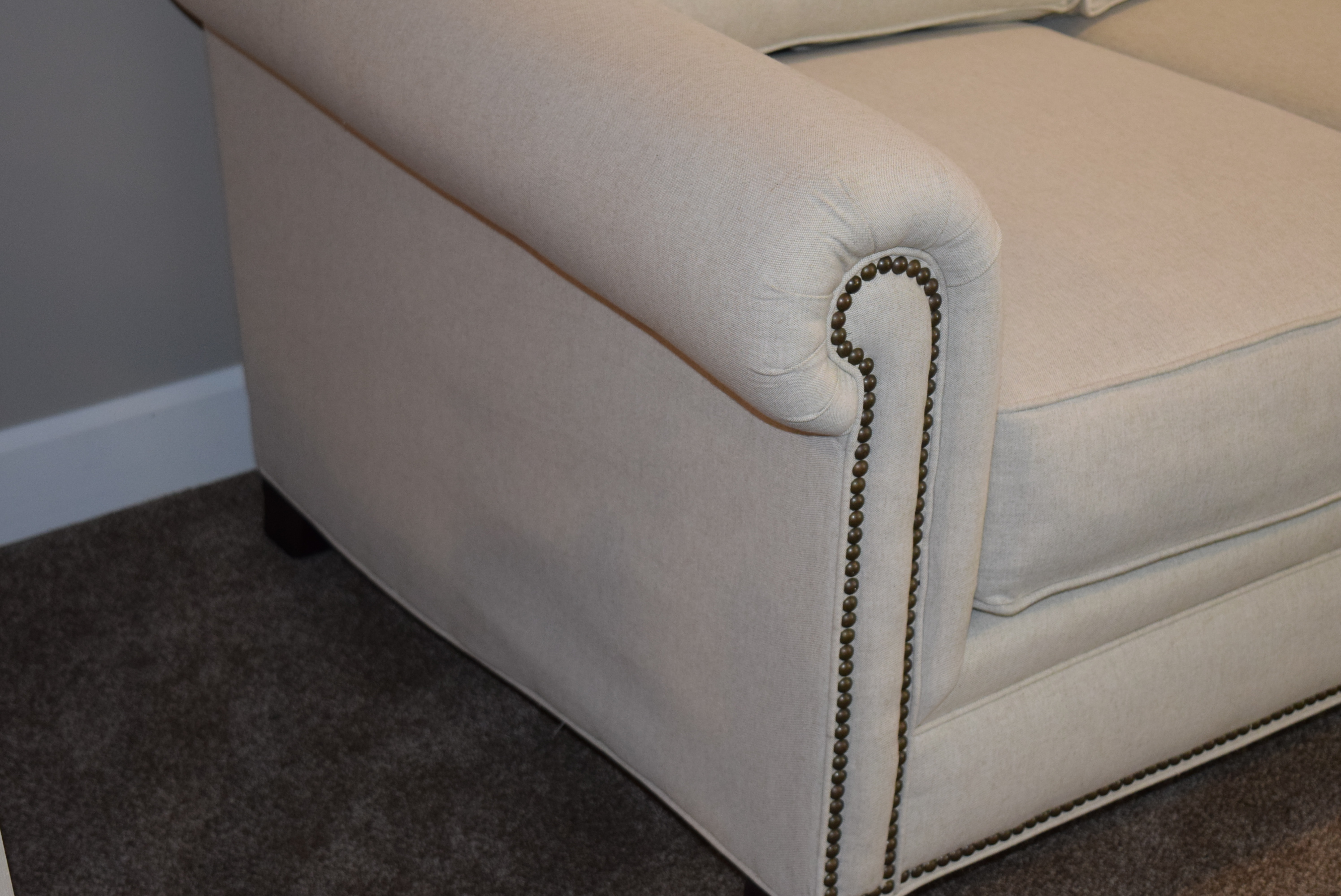 Broyhill Ivory Sofa with Accent Pillows