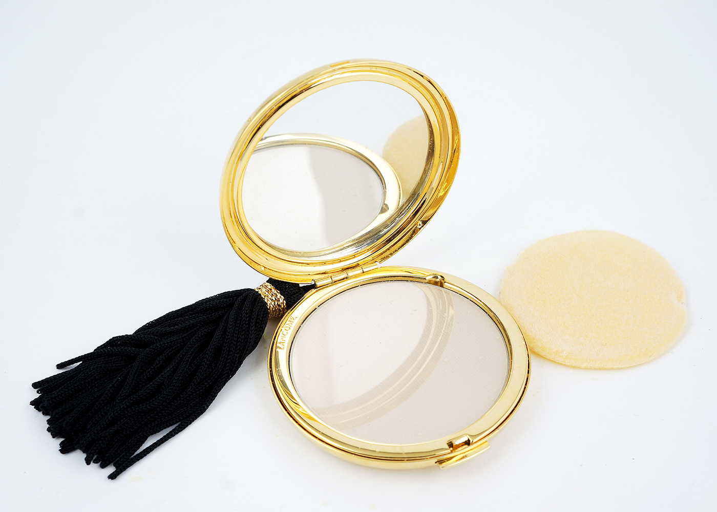 Lancome Round Black Compact with Gold Tone Dots and Black Tassel