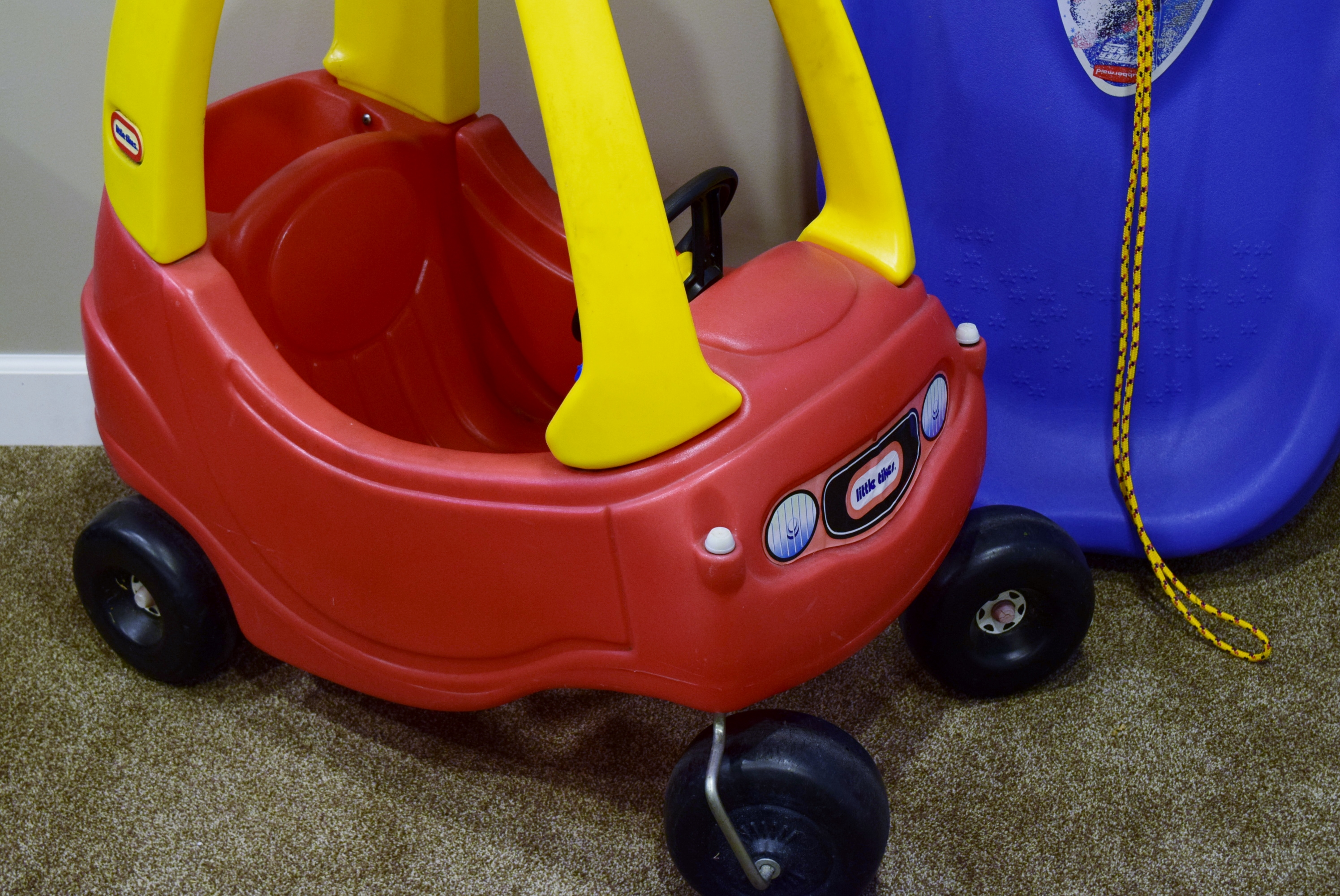 LittleTikes Cozy Coupe and Rubbermaid Sled