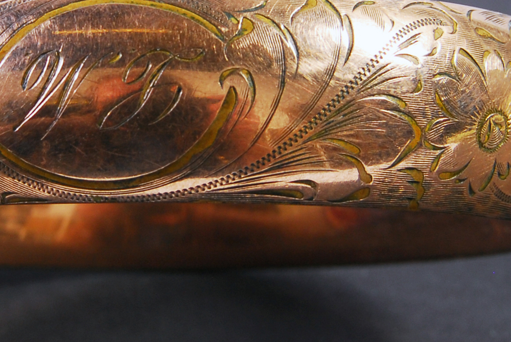 Group of Metal Bracelets and Watch