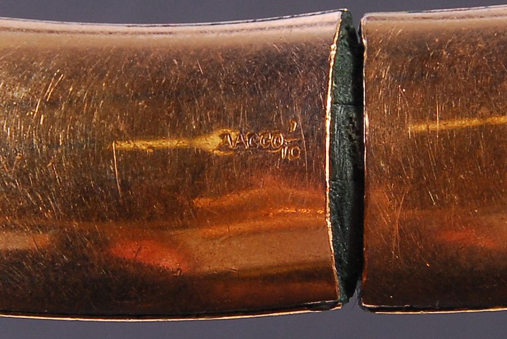 Group of Metal Bracelets and Watch