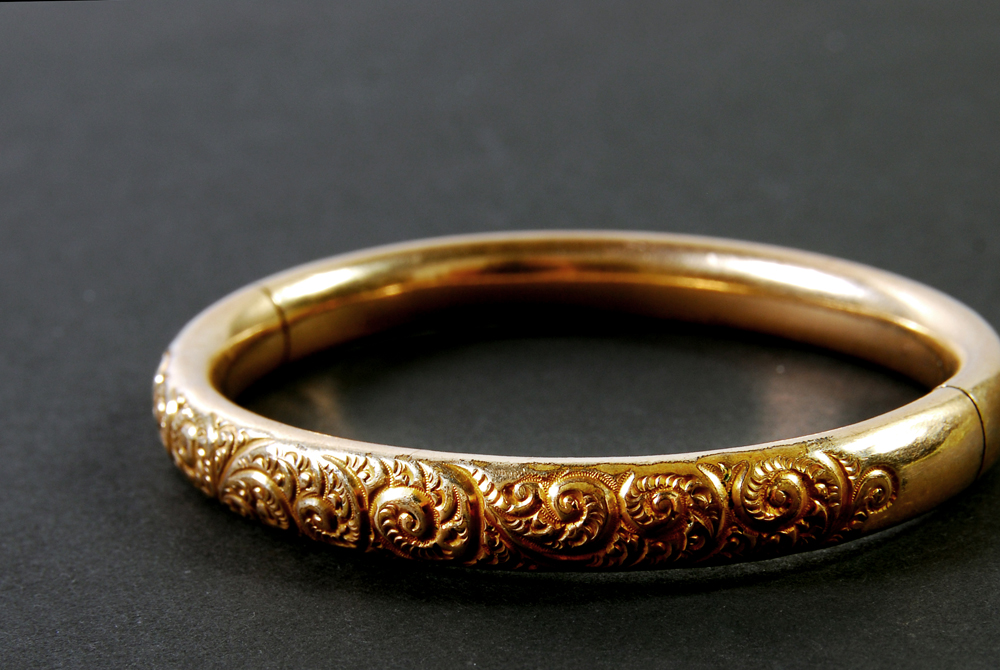 Group of Metal Bracelets and Watch