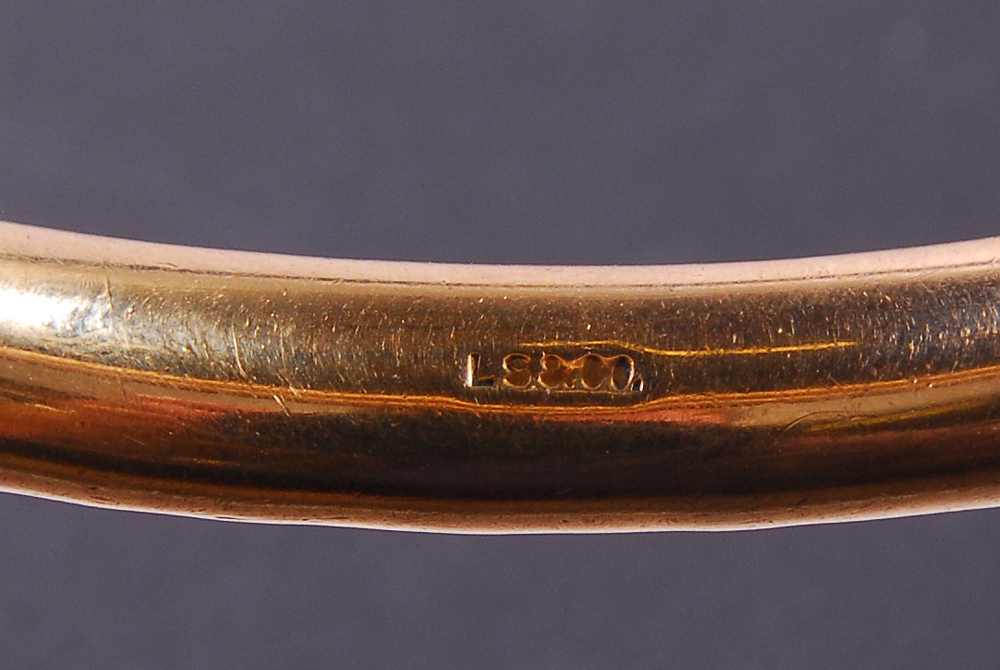 Group of Metal Bracelets and Watch