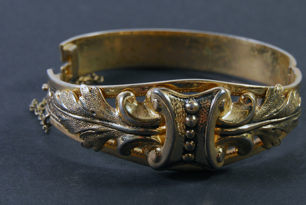 Group of Metal Bracelets and Watch