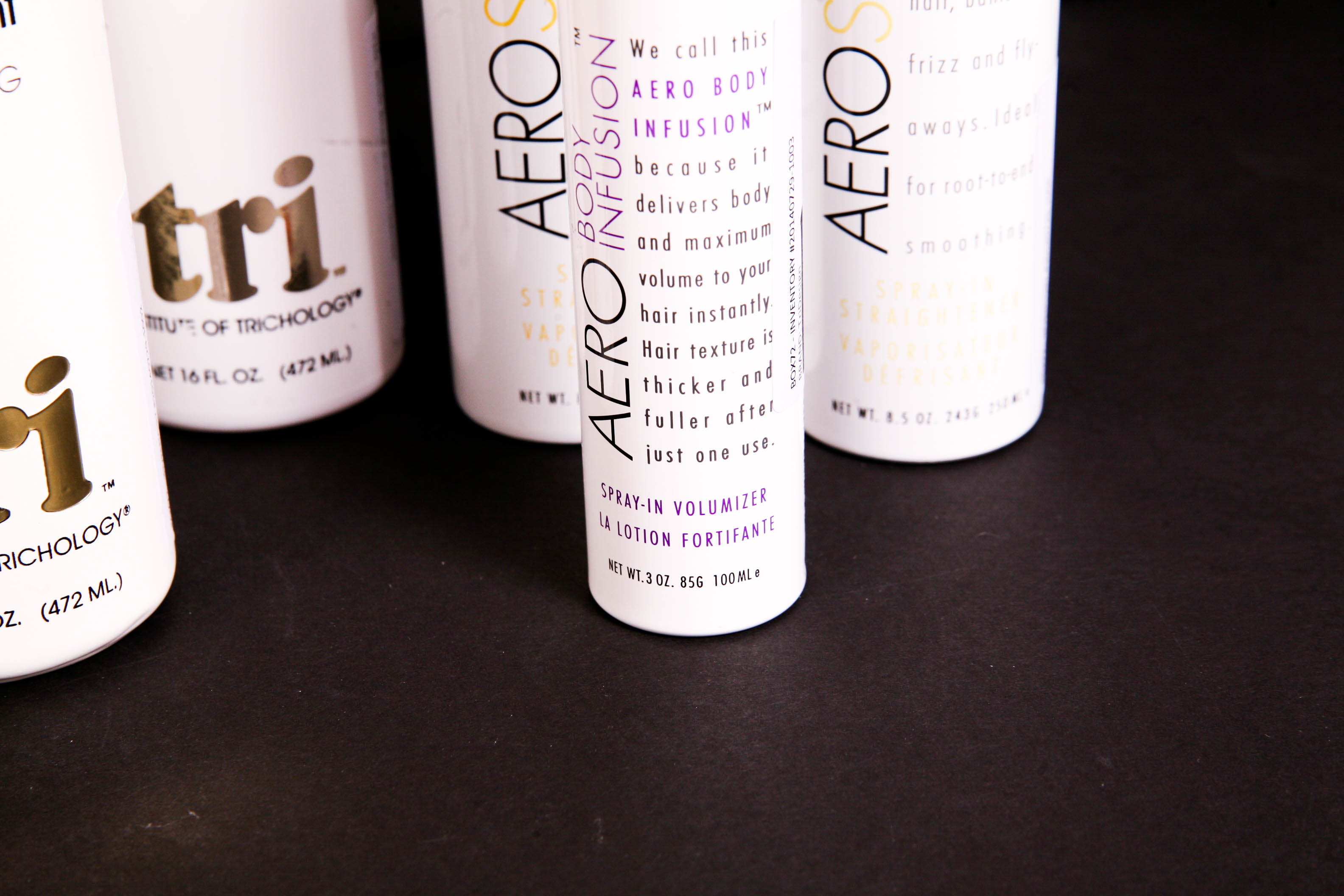 Group of Tri Design Shampoo and Styling Products