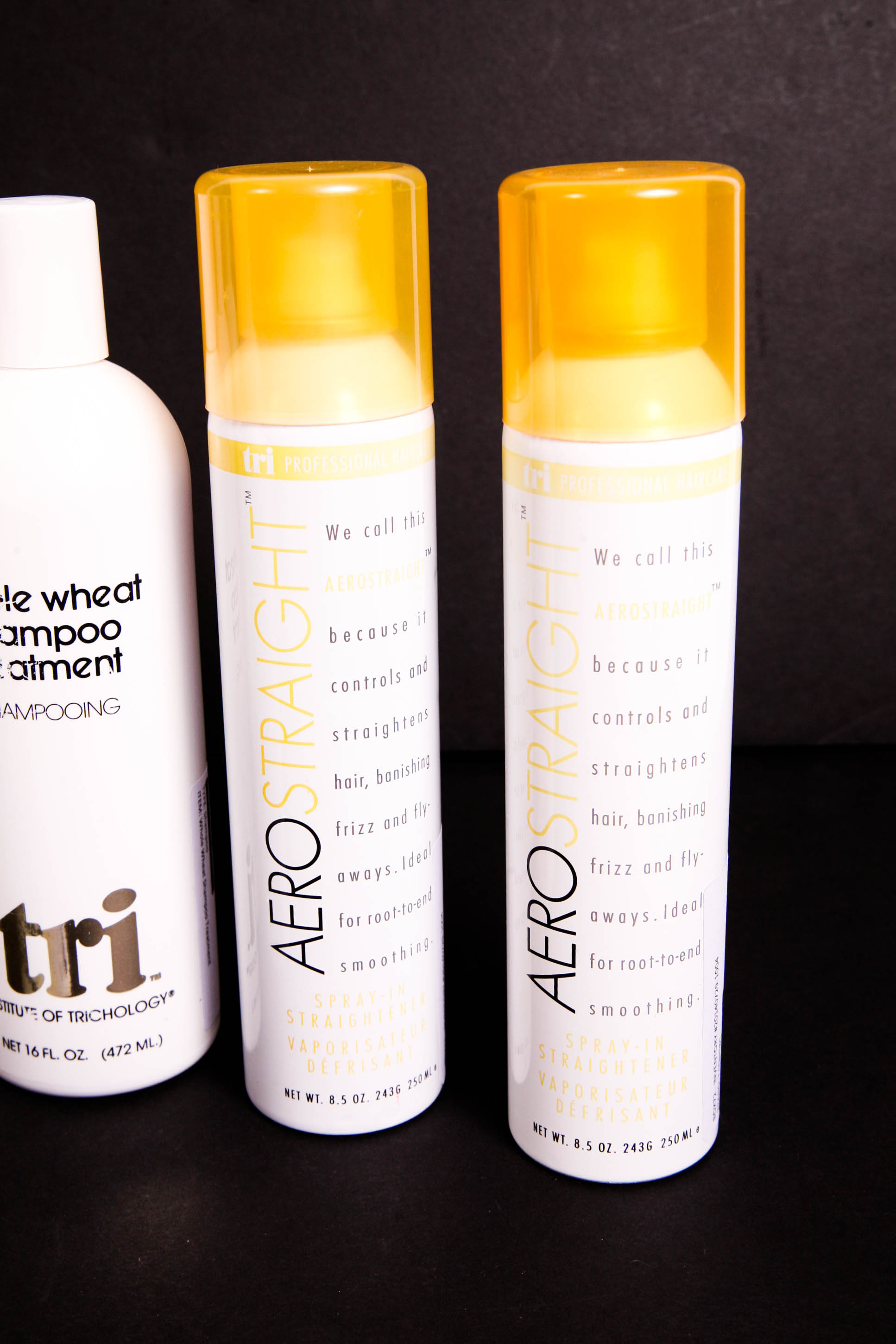 Group of Tri Design Shampoo and Styling Products