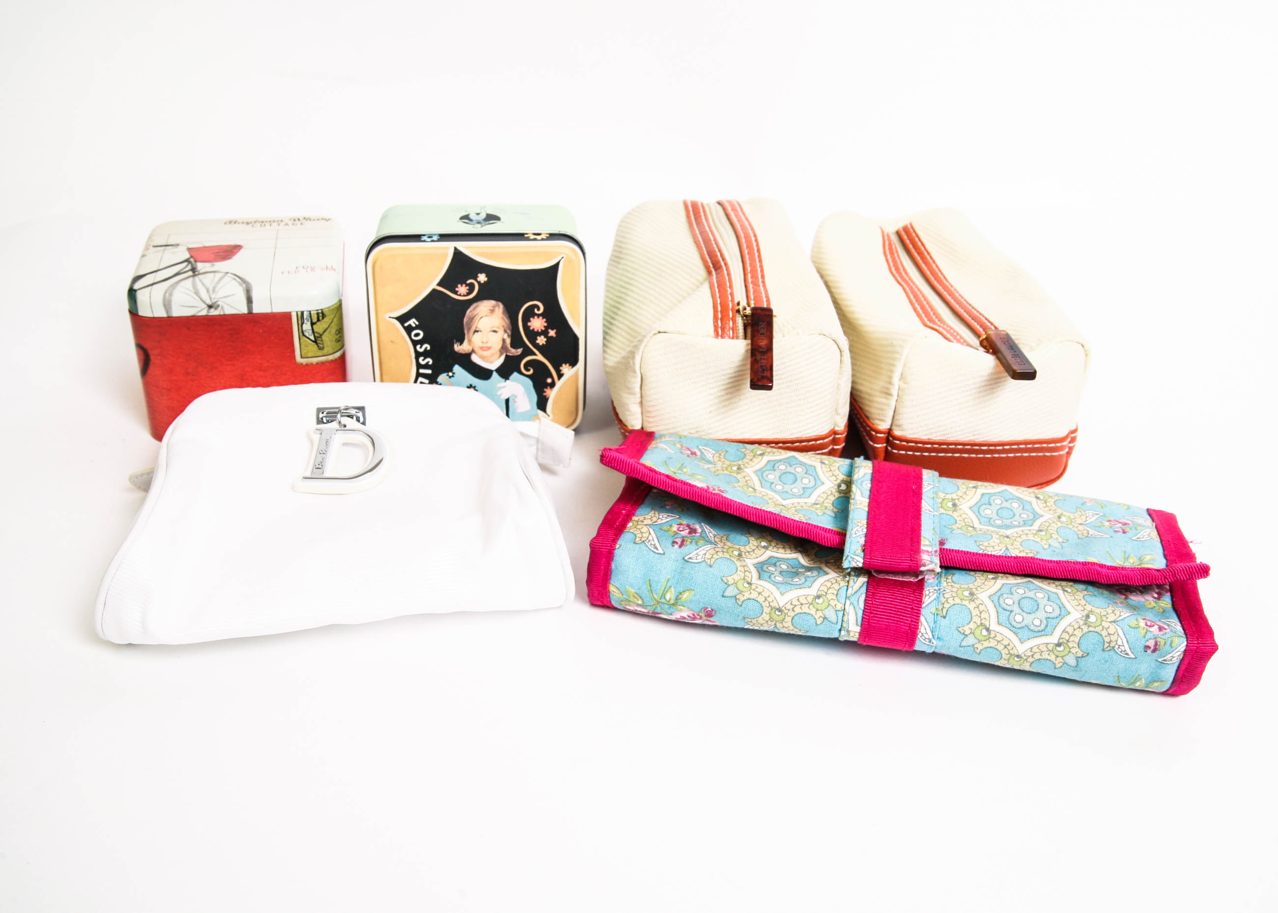 Assortment of Makeup Bags and Fossil Boxes