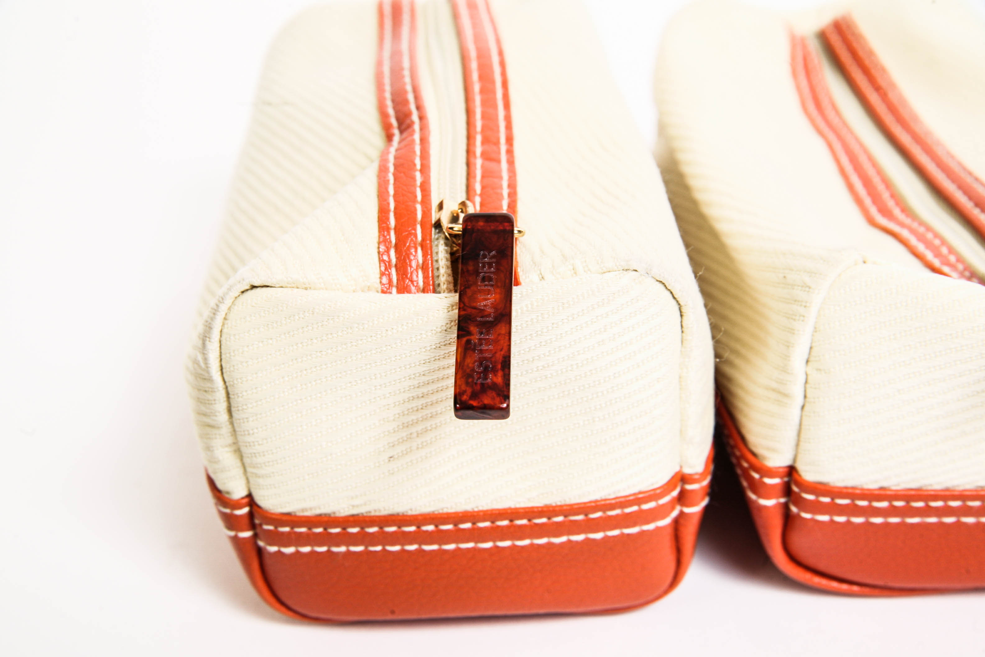 Assortment of Makeup Bags and Fossil Boxes