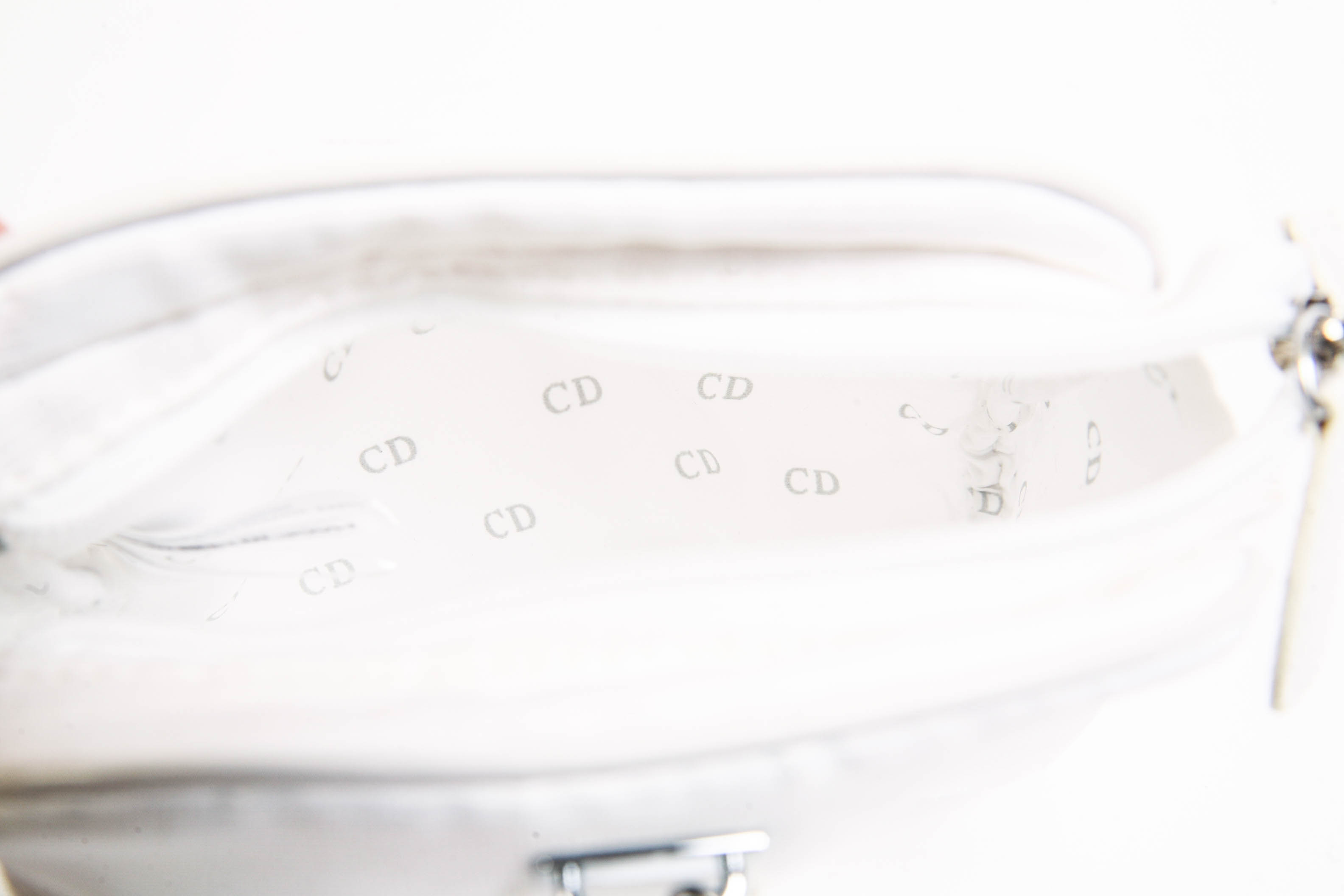 Assortment of Makeup Bags and Fossil Boxes