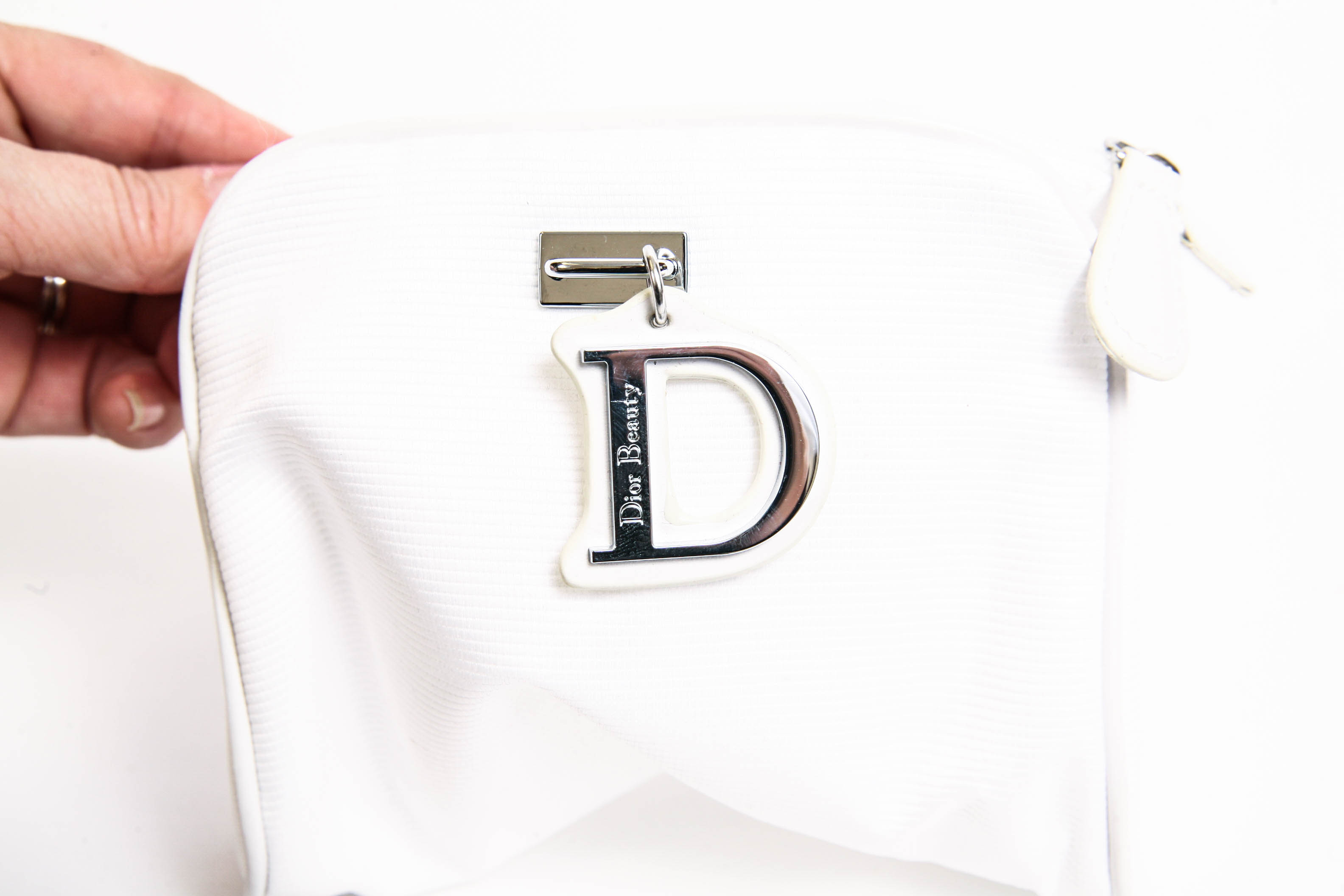 Assortment of Makeup Bags and Fossil Boxes