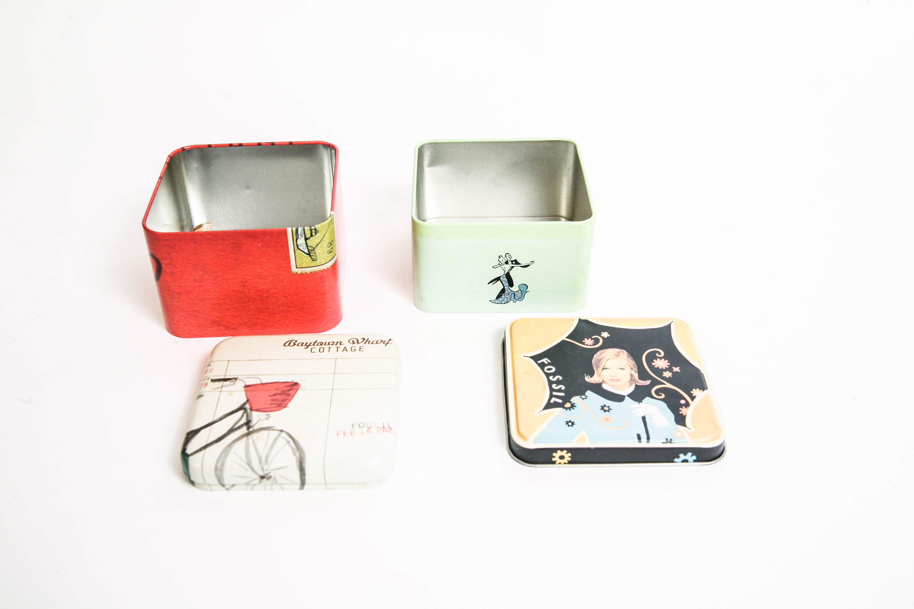 Assortment of Makeup Bags and Fossil Boxes