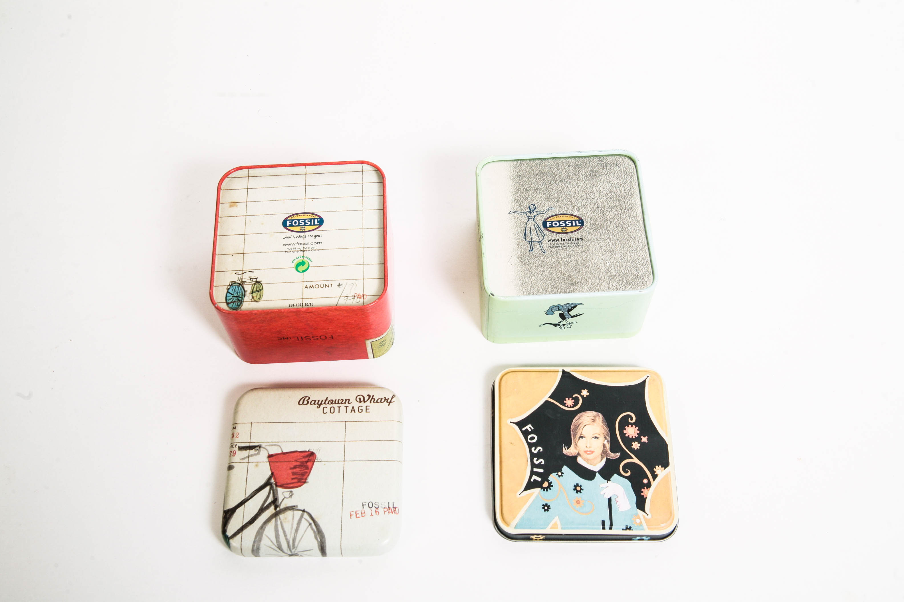 Assortment of Makeup Bags and Fossil Boxes