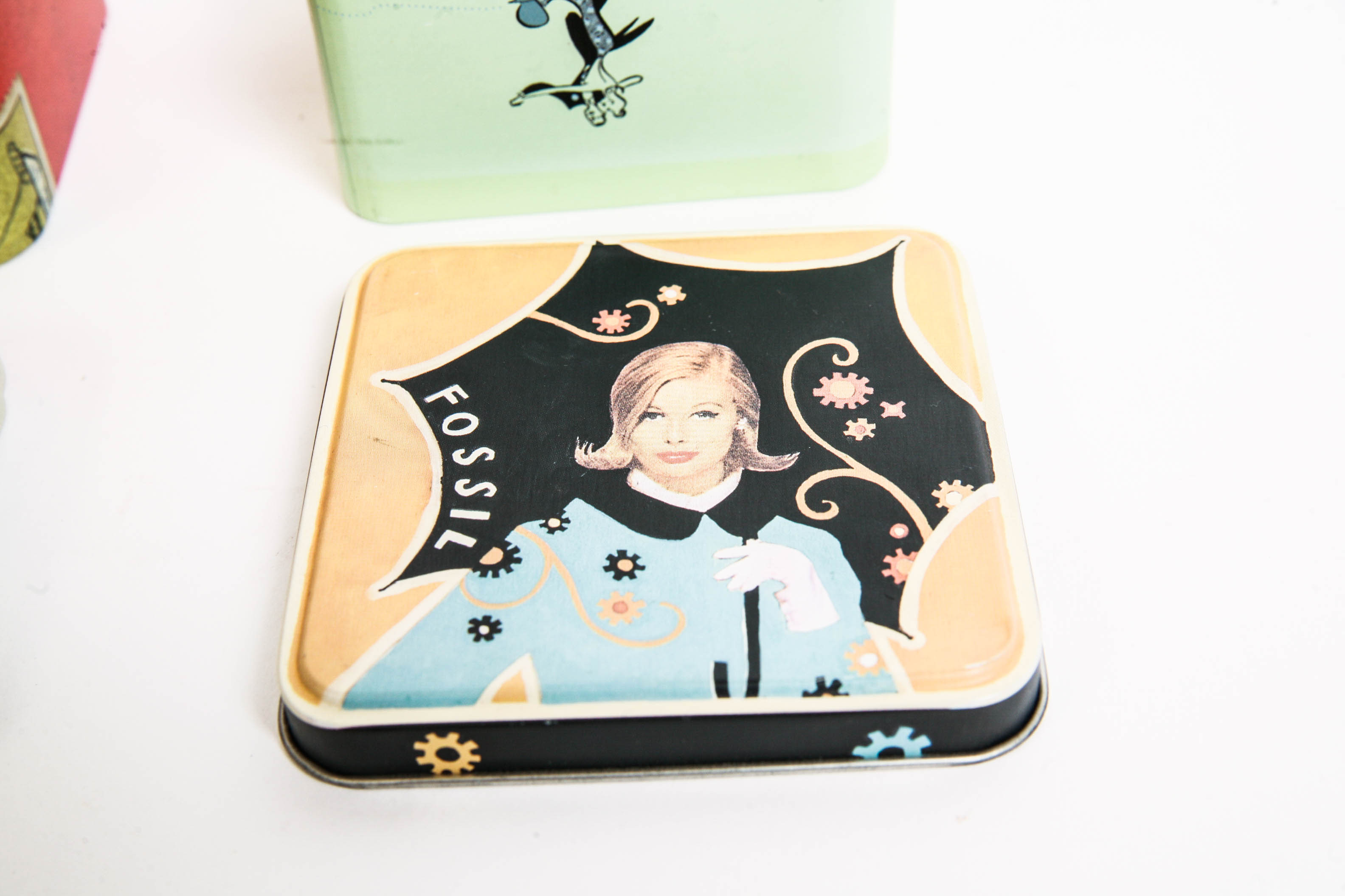 Assortment of Makeup Bags and Fossil Boxes