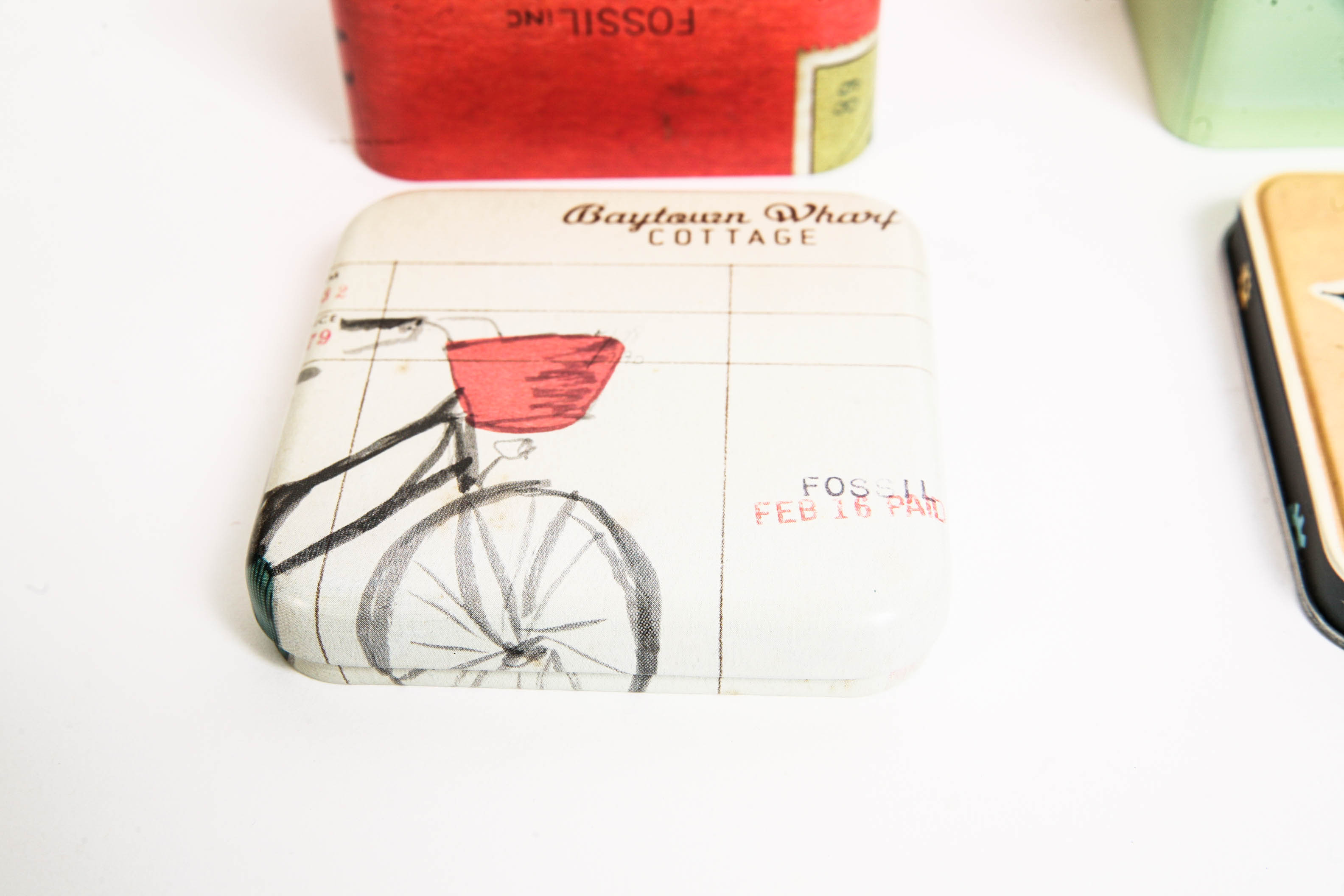 Assortment of Makeup Bags and Fossil Boxes