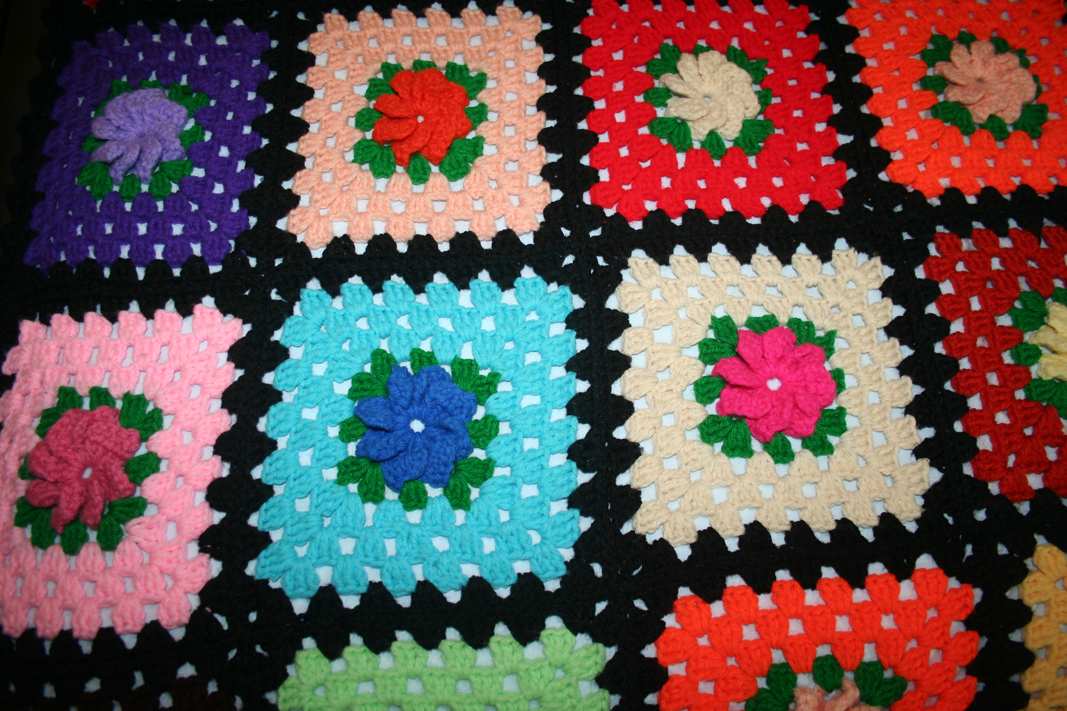 Hand-Crocheted Afghans in Floral Patterns