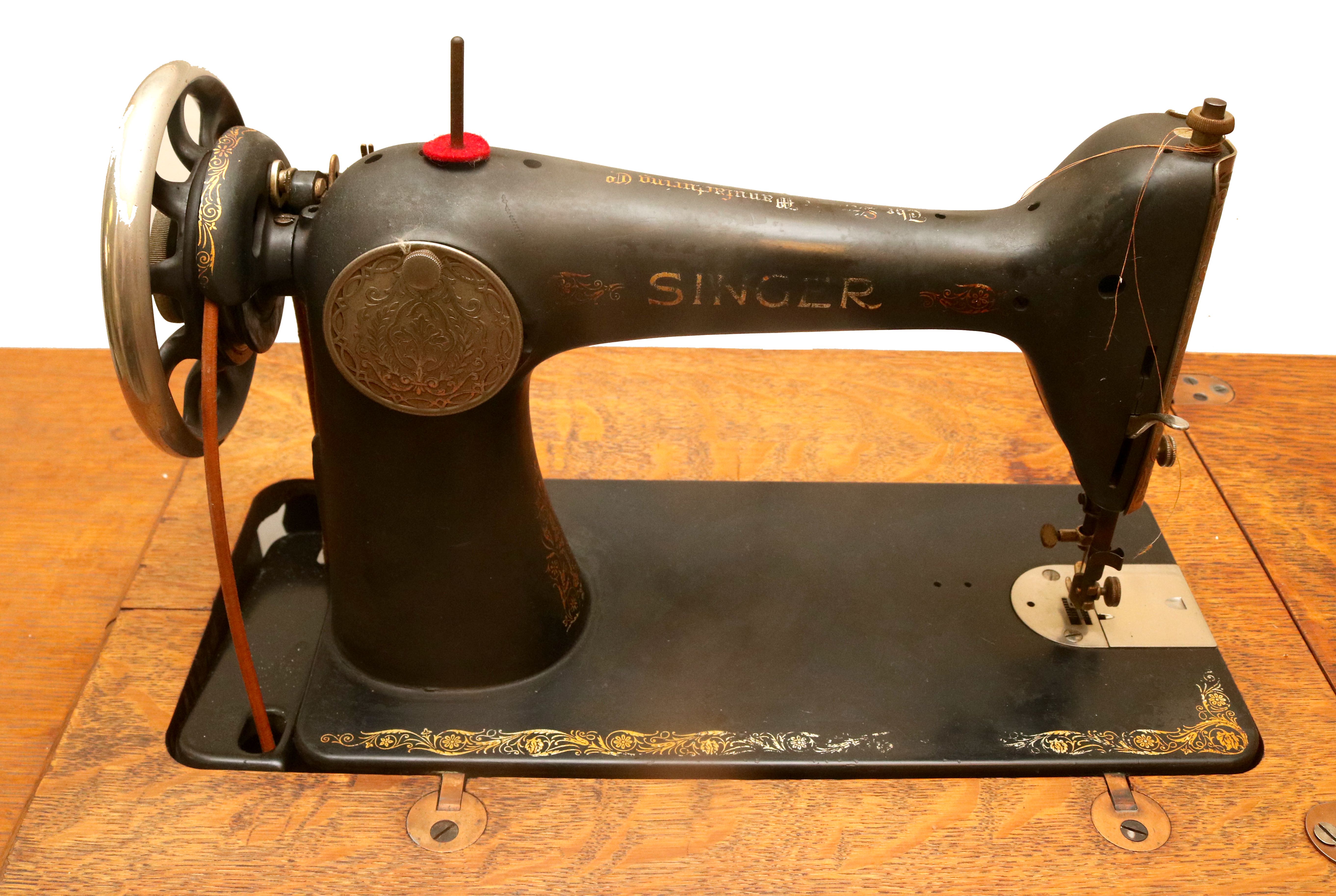 Singer Sewing Machine with Cast Iron Base