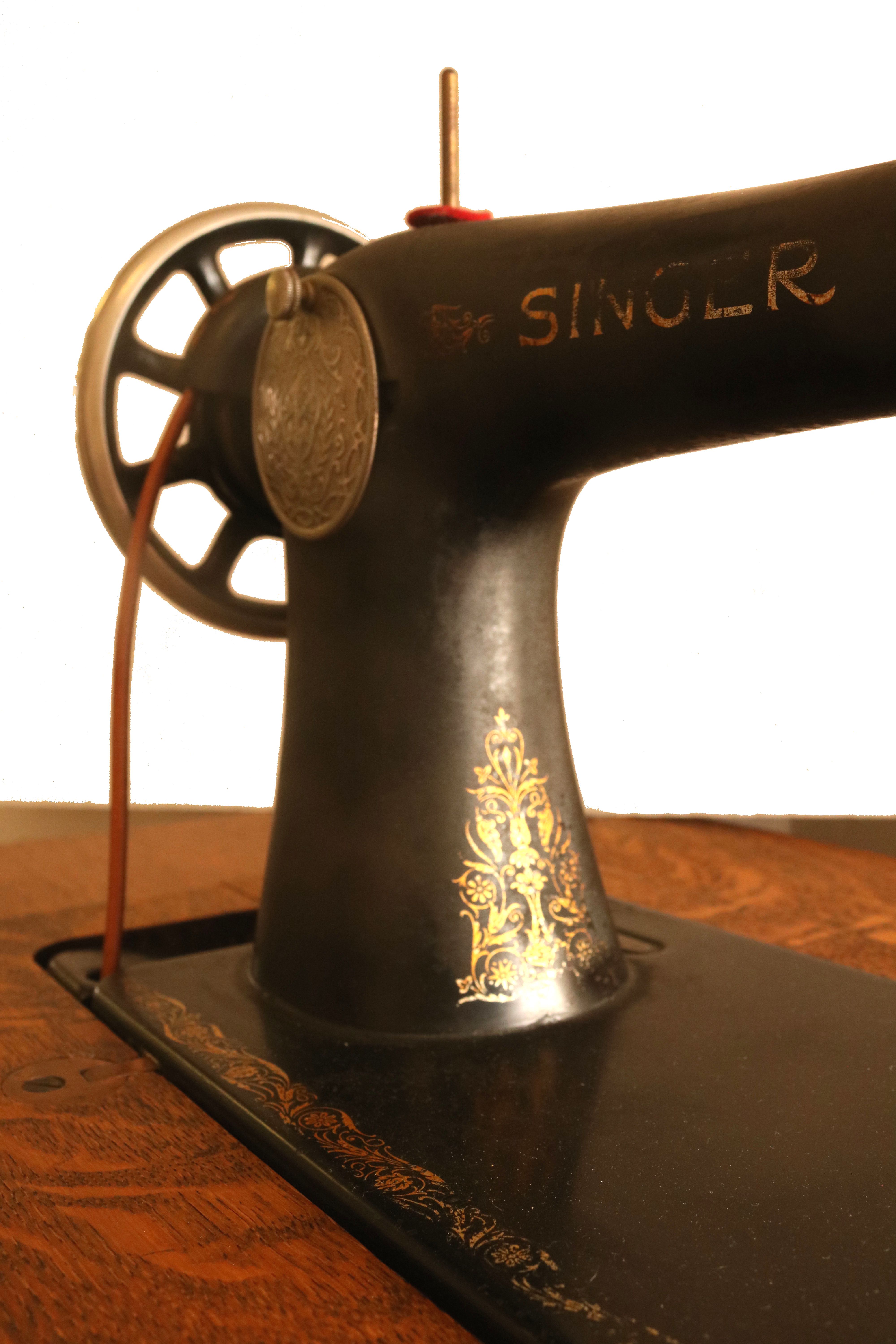Singer Sewing Machine with Cast Iron Base