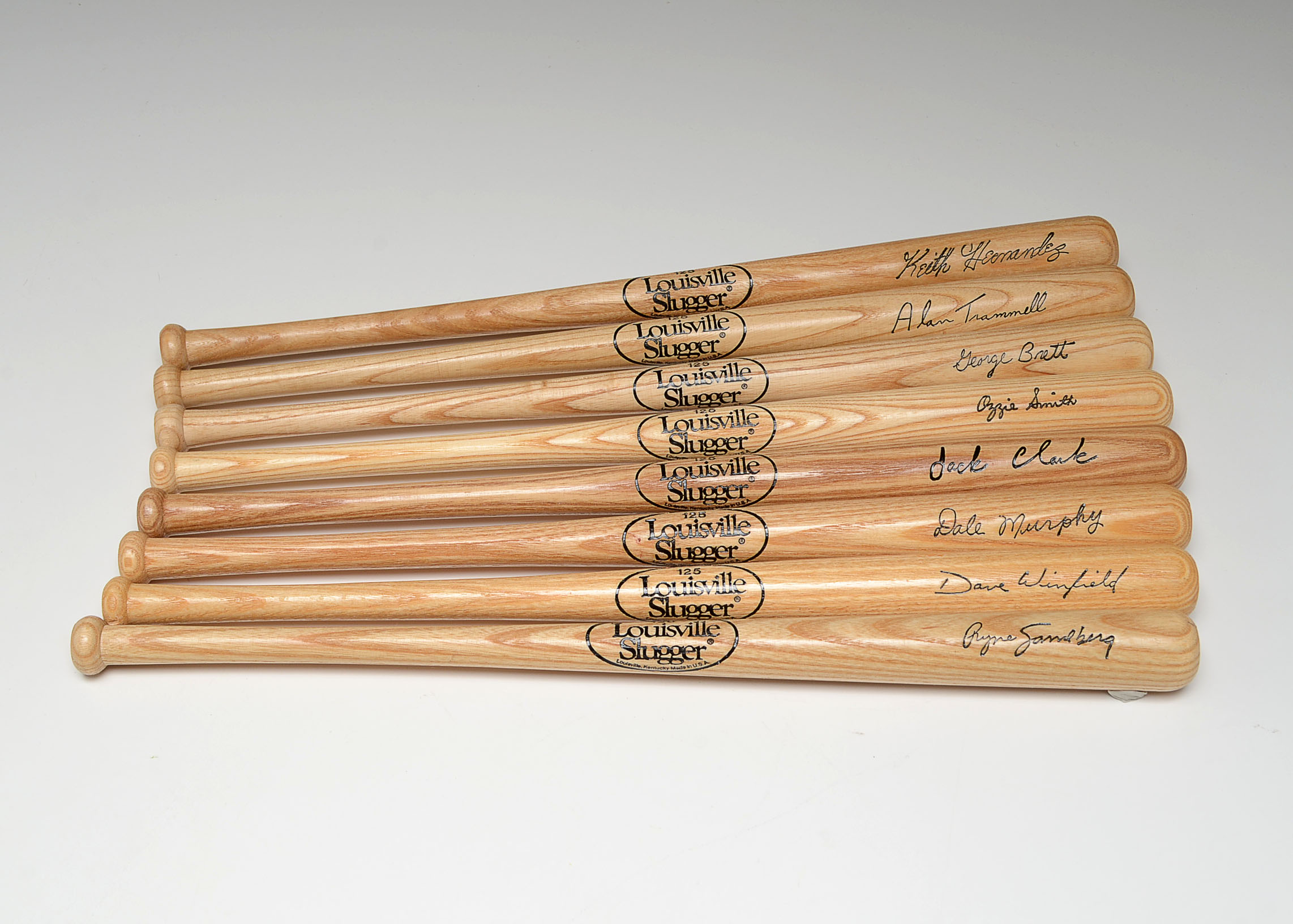 Eight Mini Baseball Bats