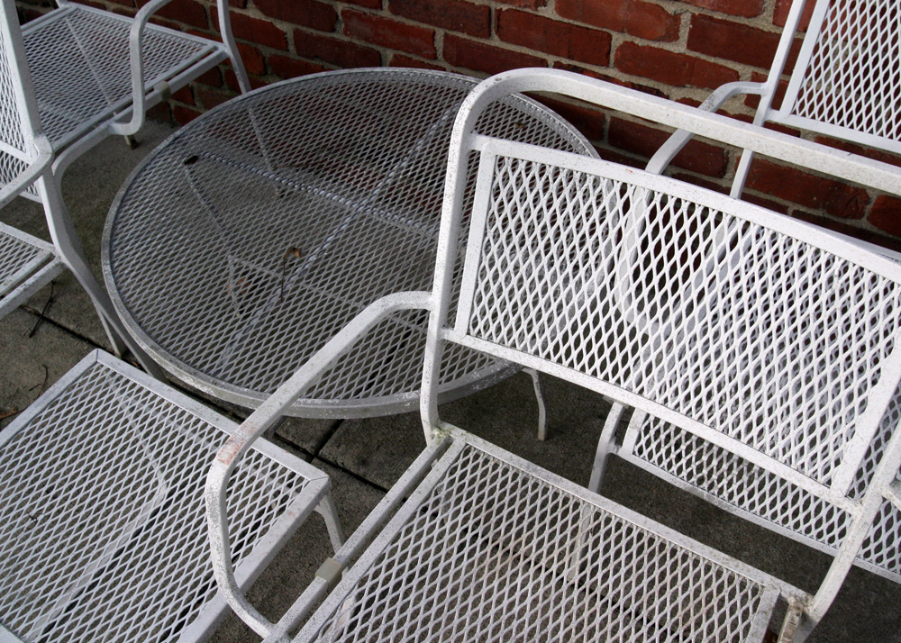 Grouping of White Mesh Patio Furniture