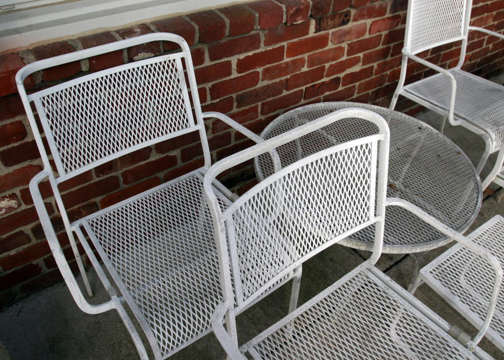 Grouping of White Mesh Patio Furniture