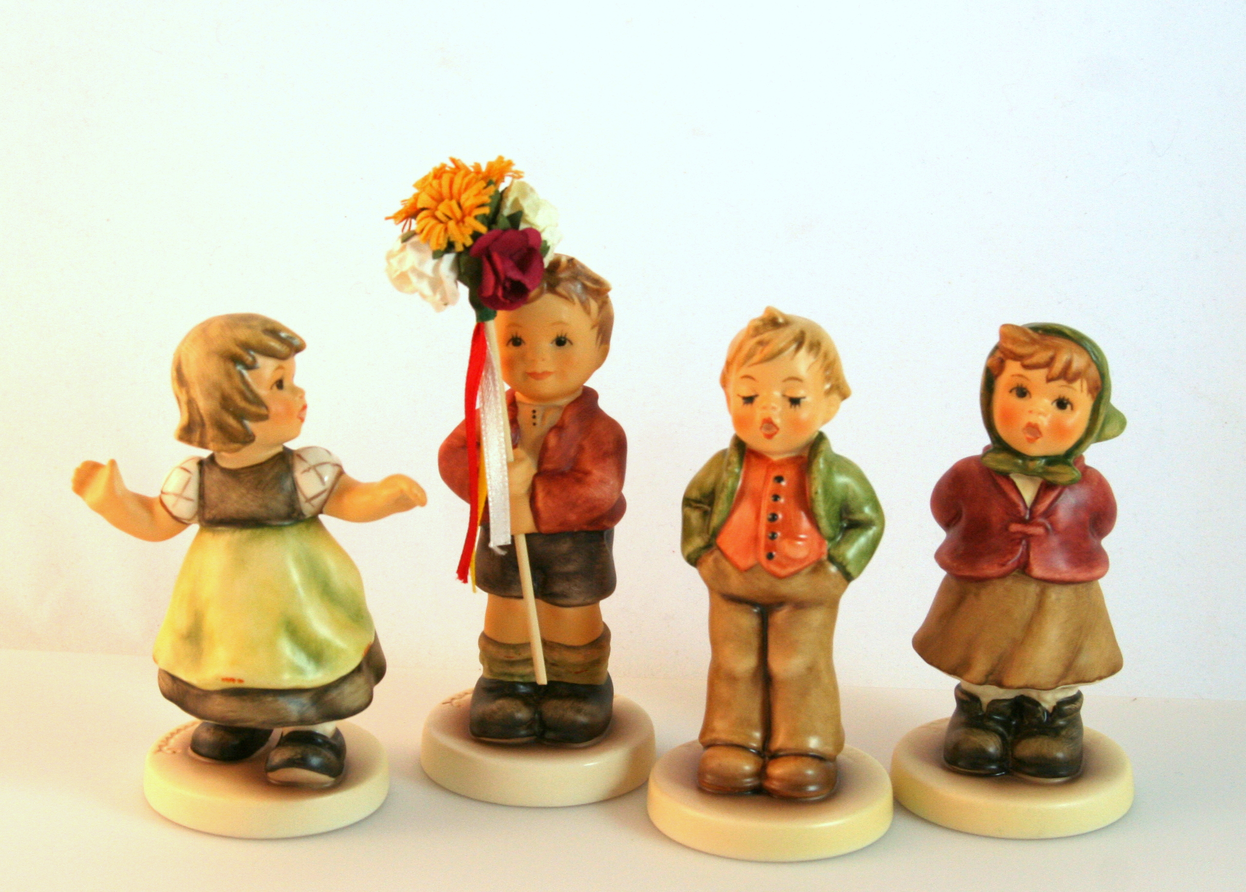 Four Small M. I. Hummel Special Edition Figurines