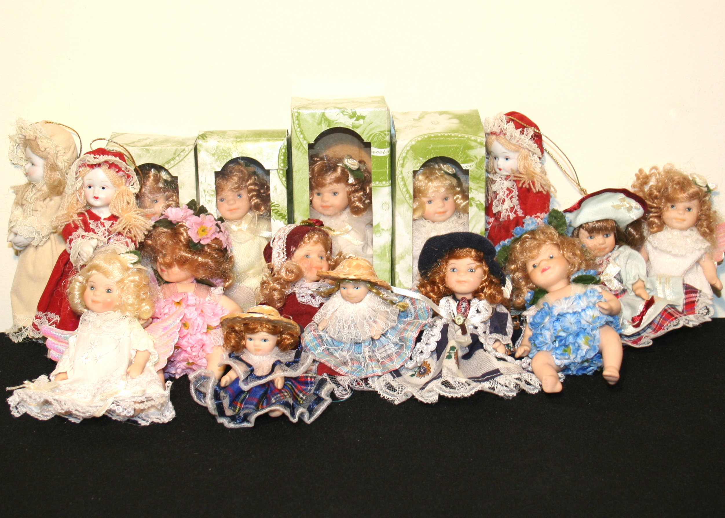 Collection of 4" Porcelain Dolls