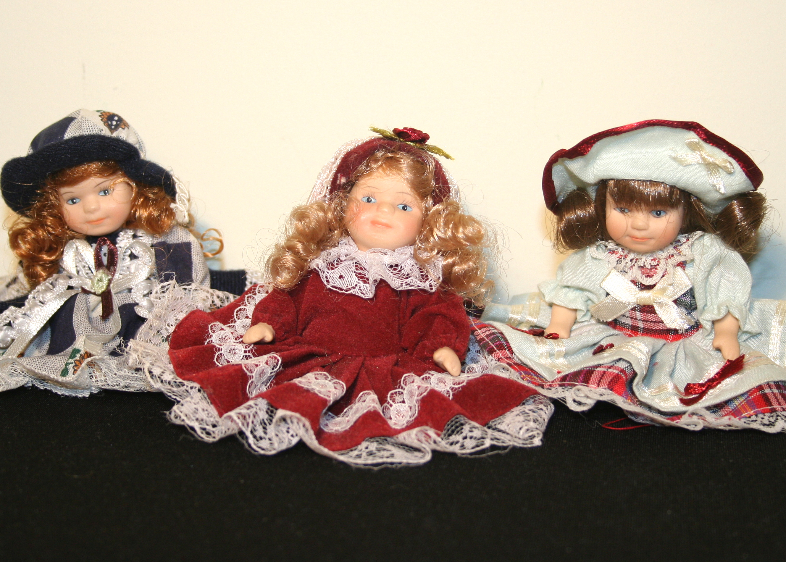 Collection of 4" Porcelain Dolls
