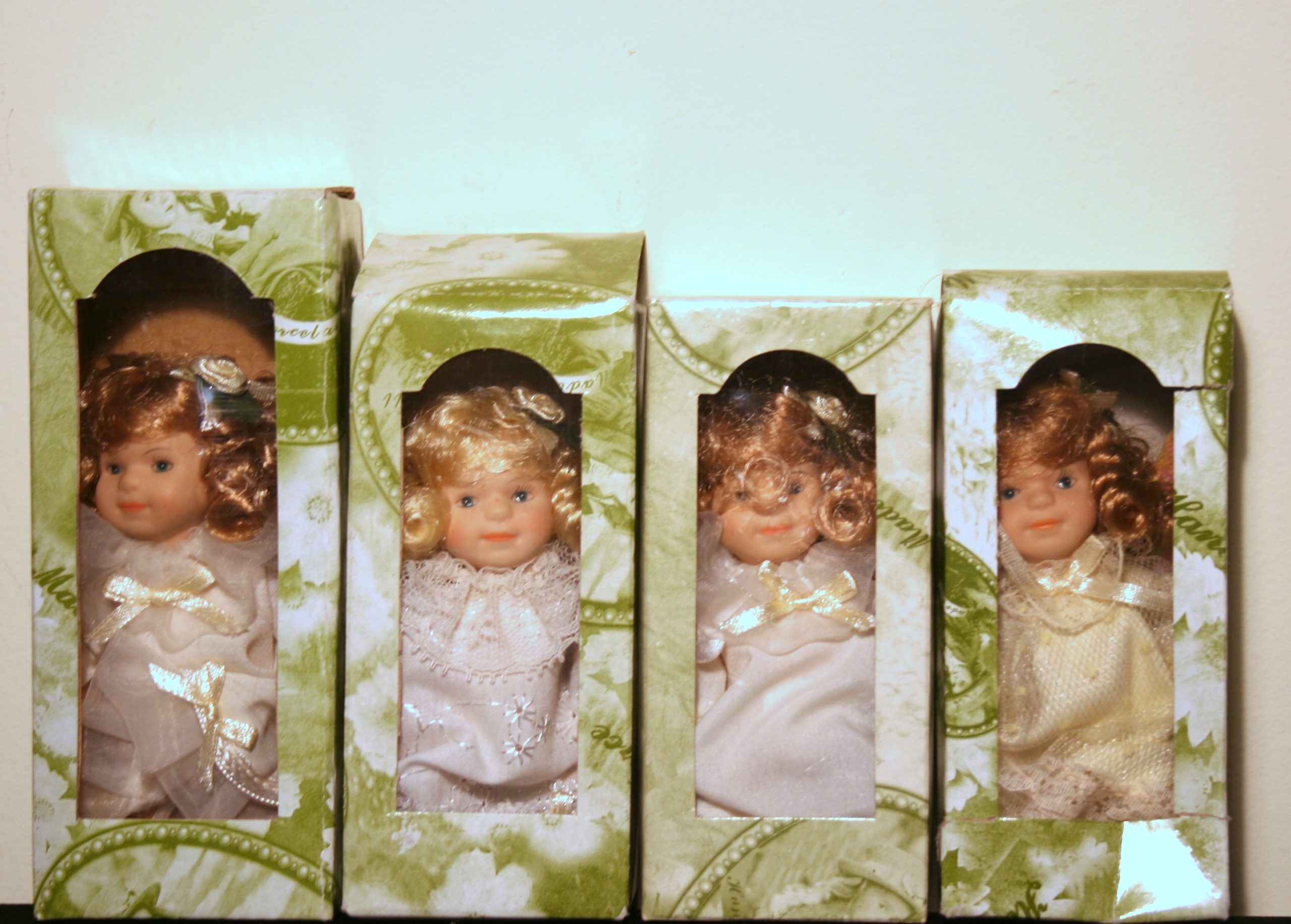 Collection of 4" Porcelain Dolls