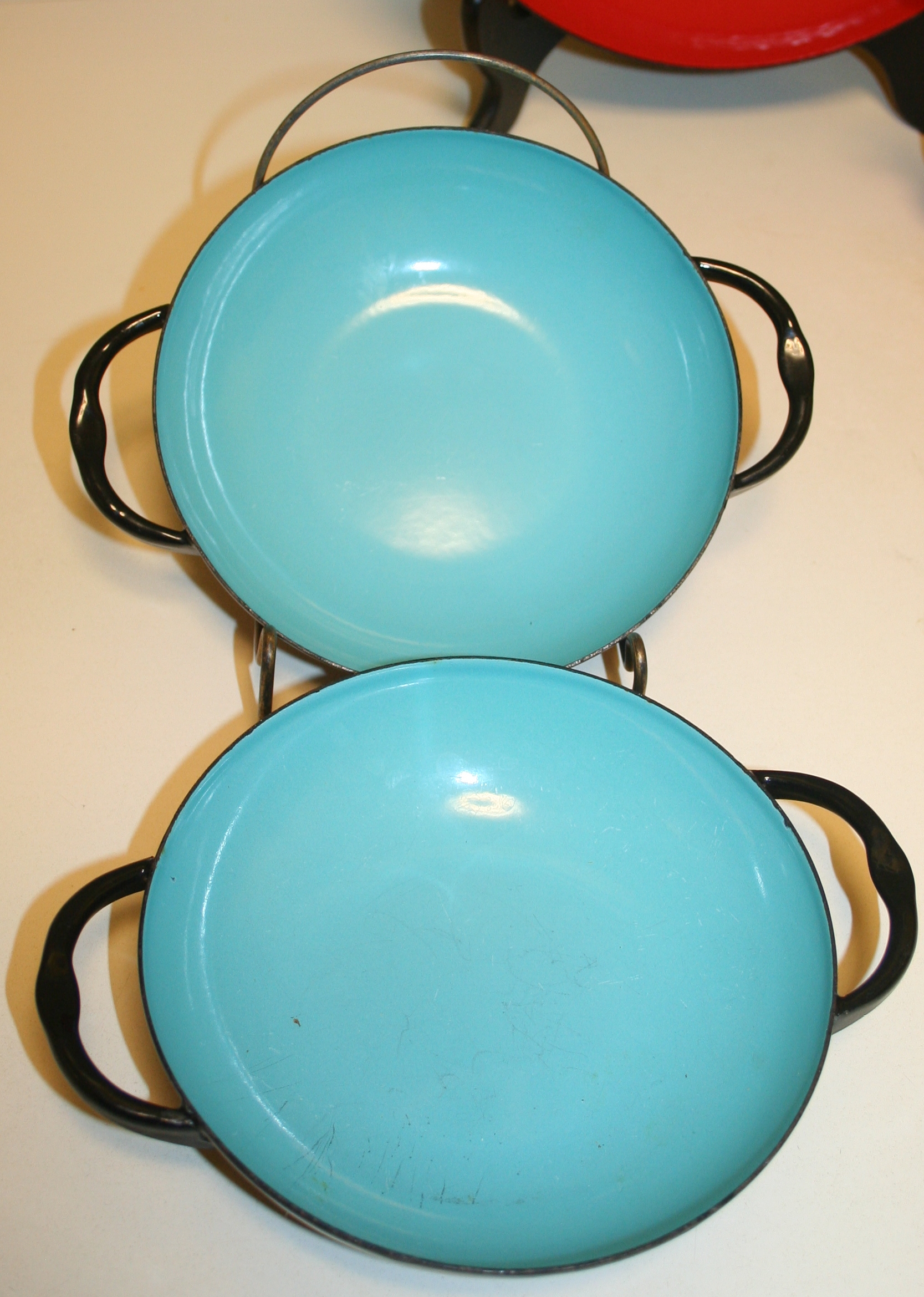 Caravelle Sizzling Servers and Red Enamelware