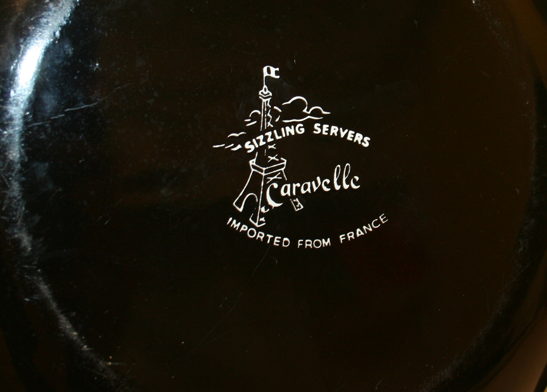 Caravelle Sizzling Servers and Red Enamelware