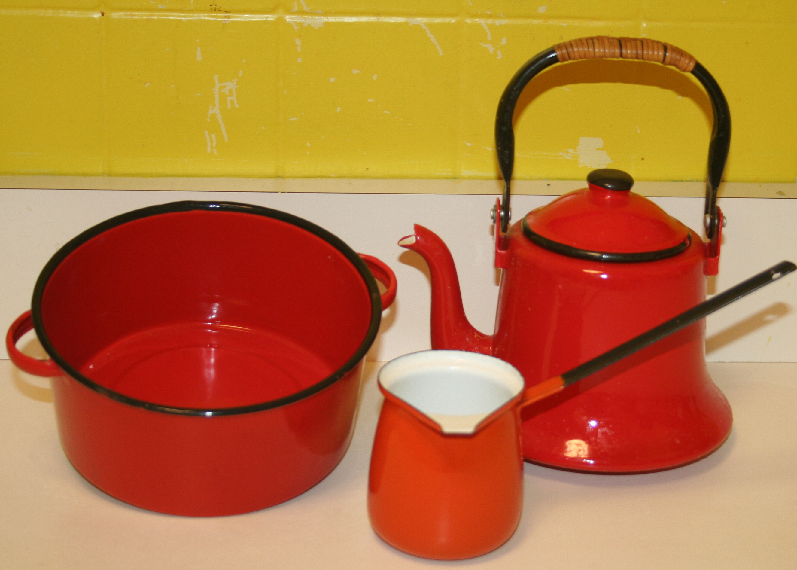 Caravelle Sizzling Servers and Red Enamelware
