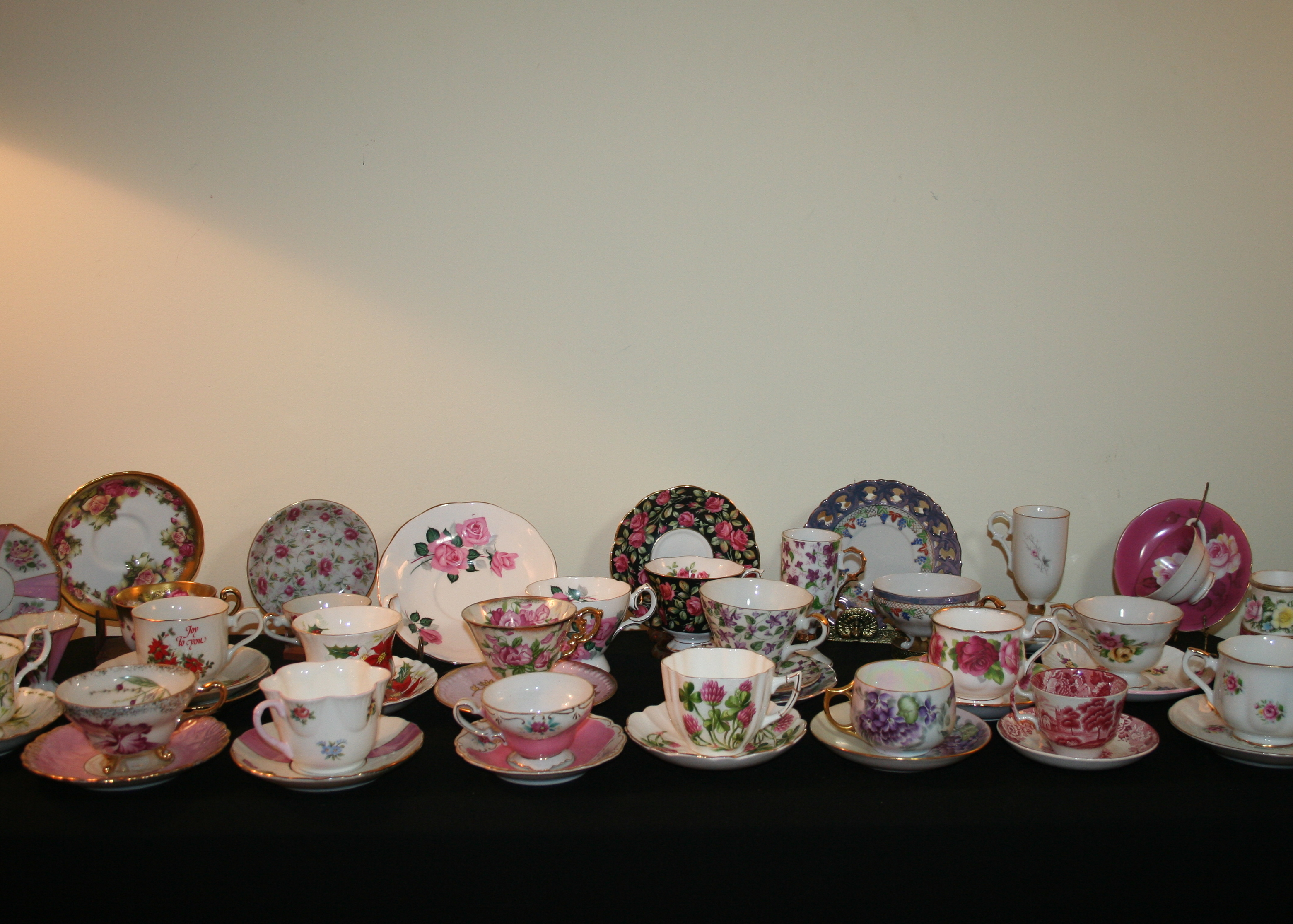 Collection of Floral Patterned Cups and Saucers