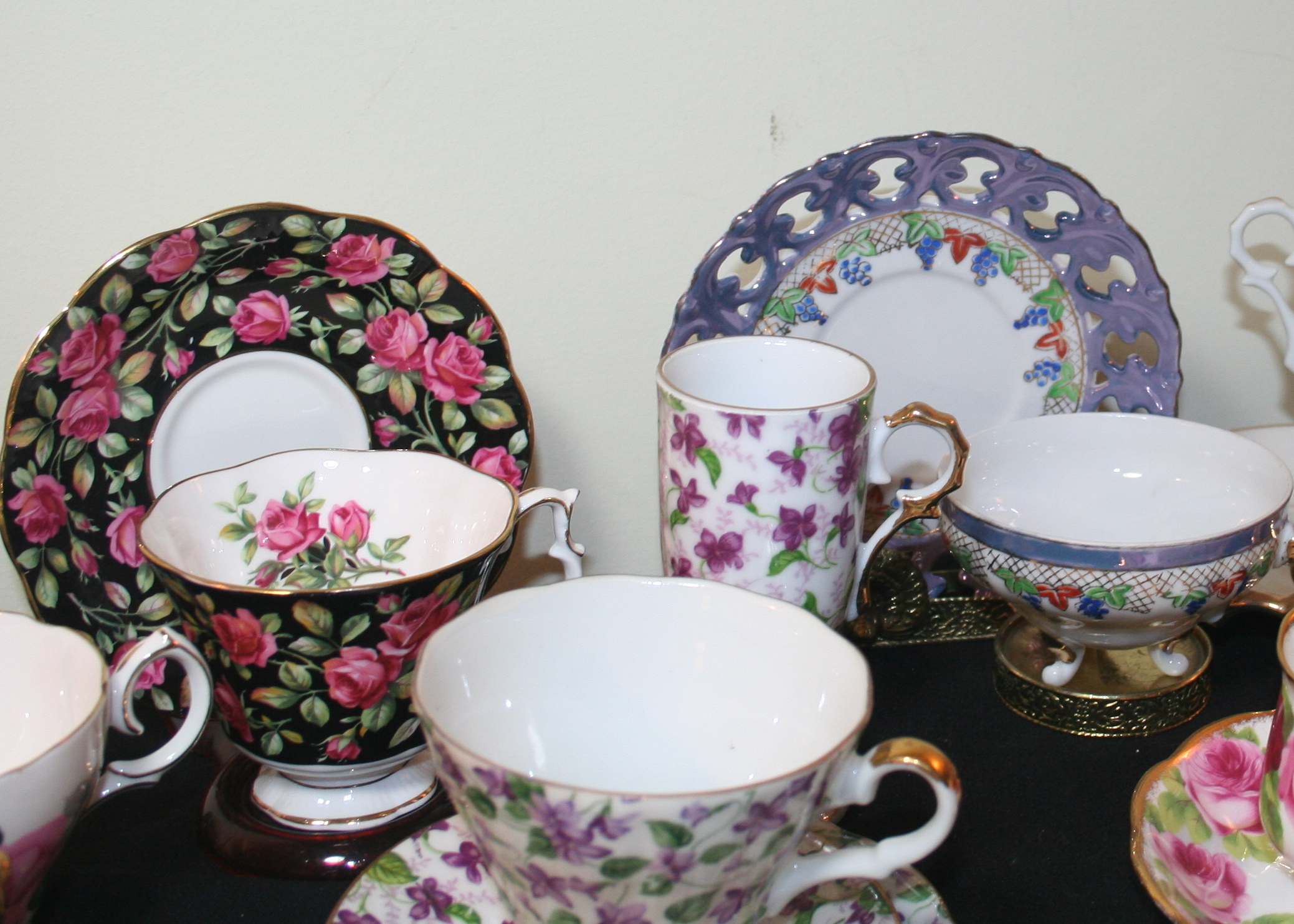 Collection of Floral Patterned Cups and Saucers