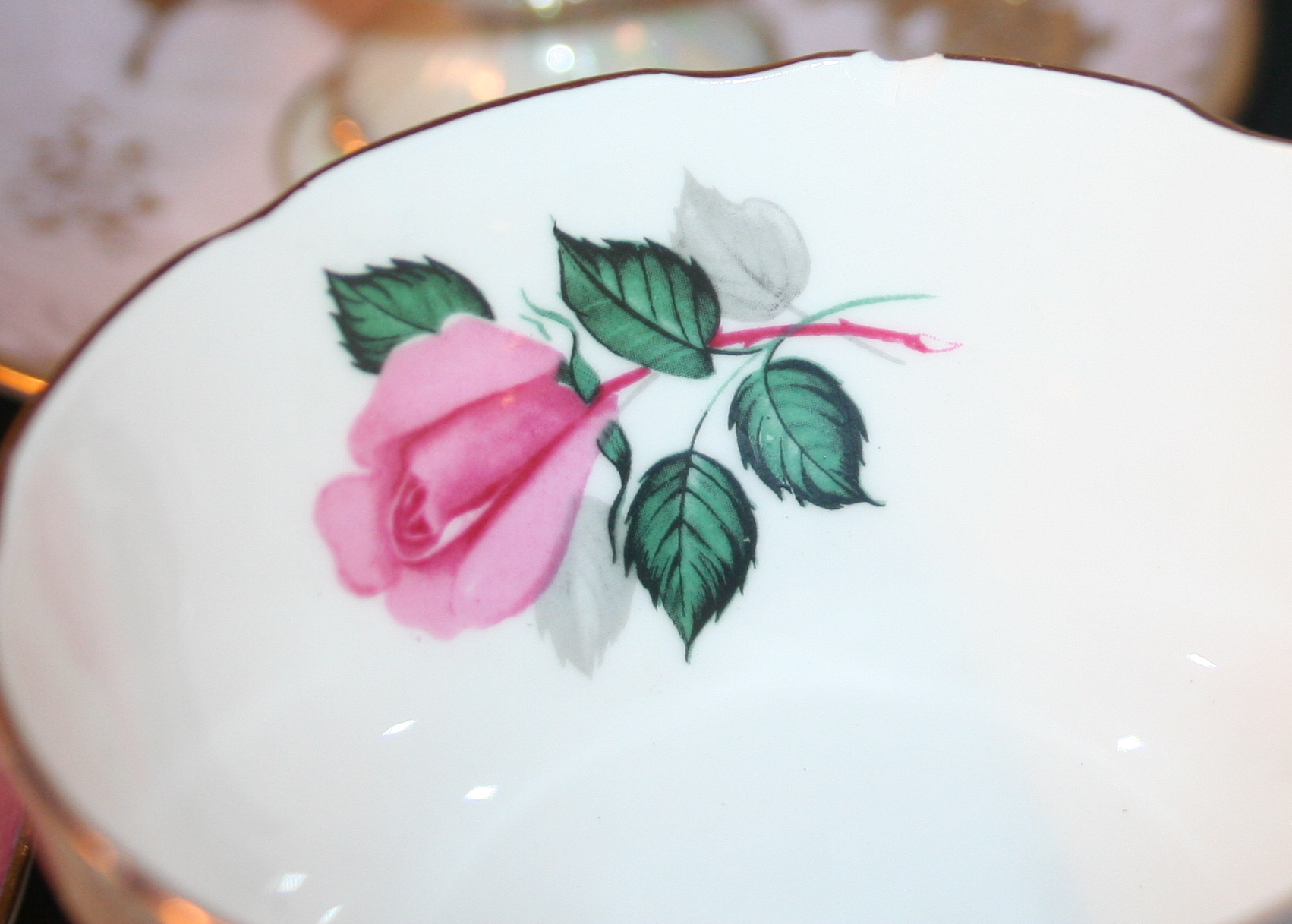 Collection of Floral Patterned Cups and Saucers