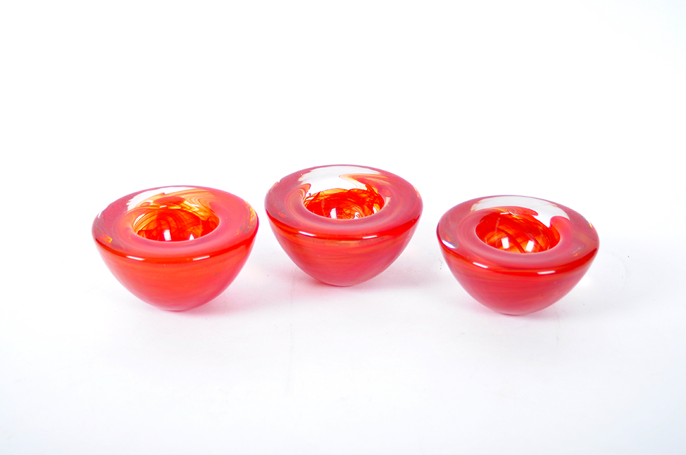 Set of Kosta Boda Orange Swirl Votive Bowls