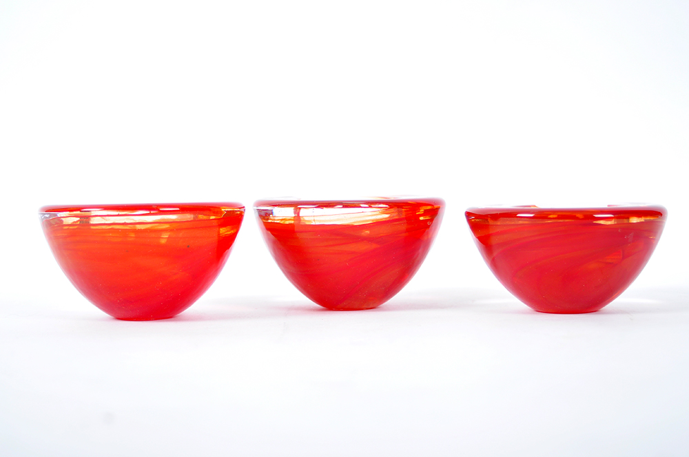 Set of Kosta Boda Orange Swirl Votive Bowls