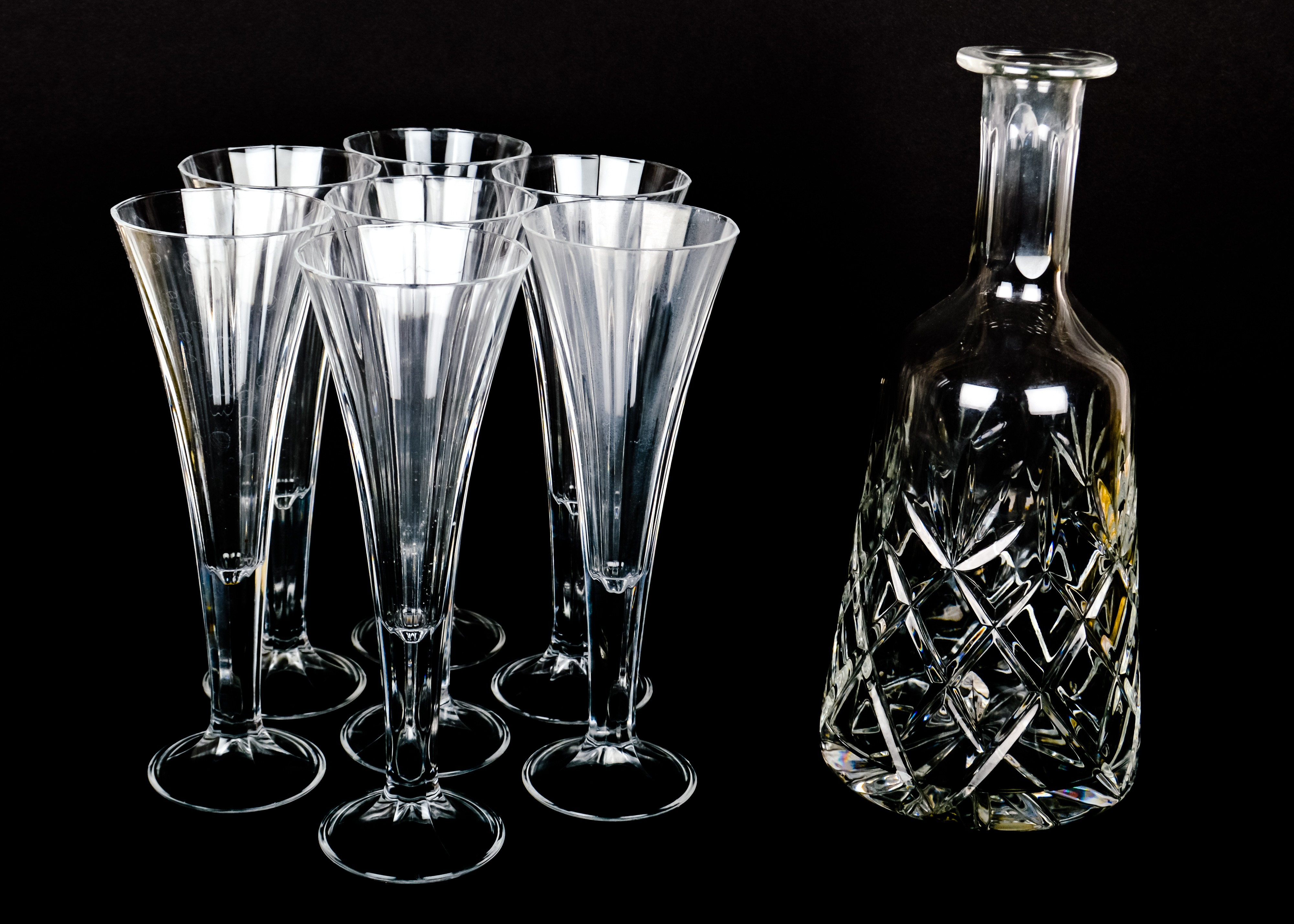 Seven Trumpet Champagne Flutes and Decanter