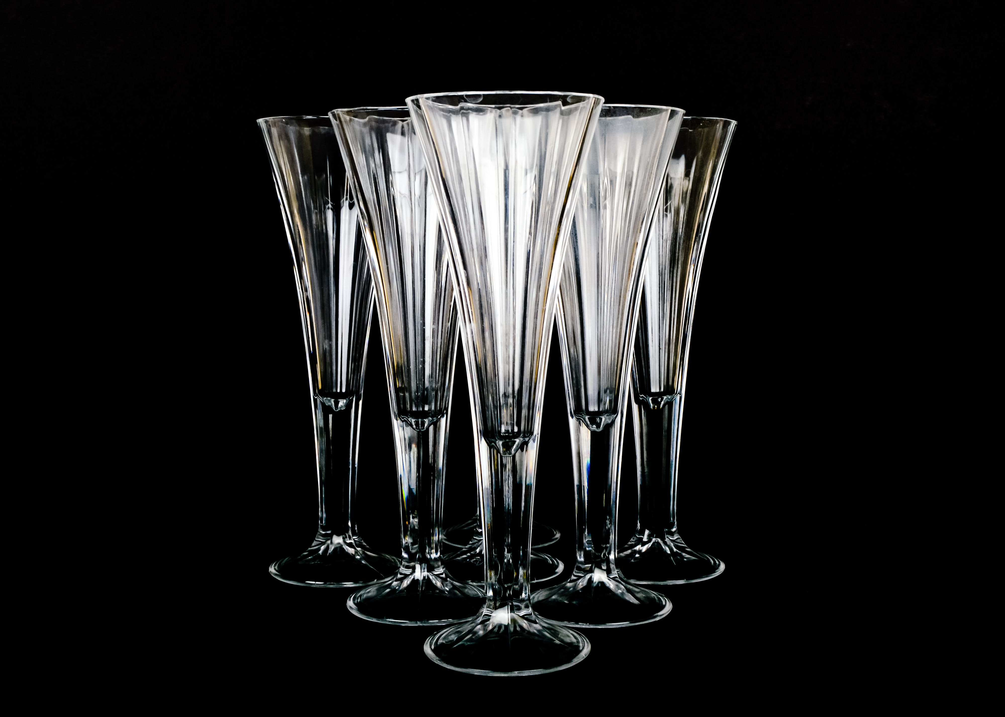 Seven Trumpet Champagne Flutes and Decanter