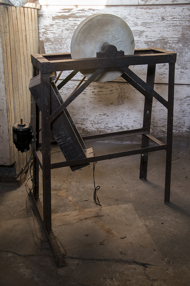 Vintage Grinding Stone on Stand