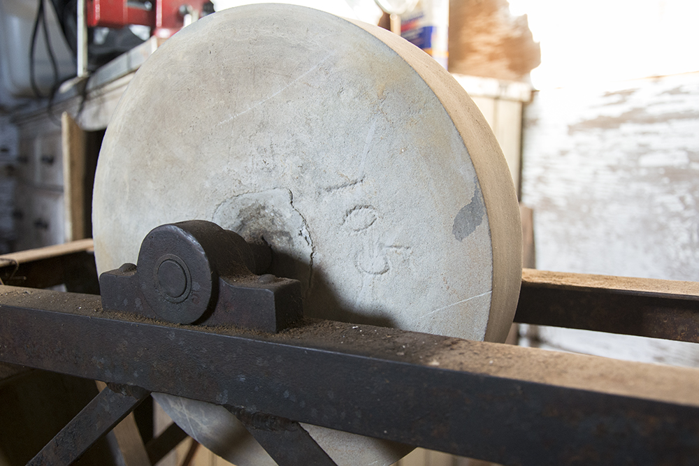 Vintage Grinding Stone on Stand