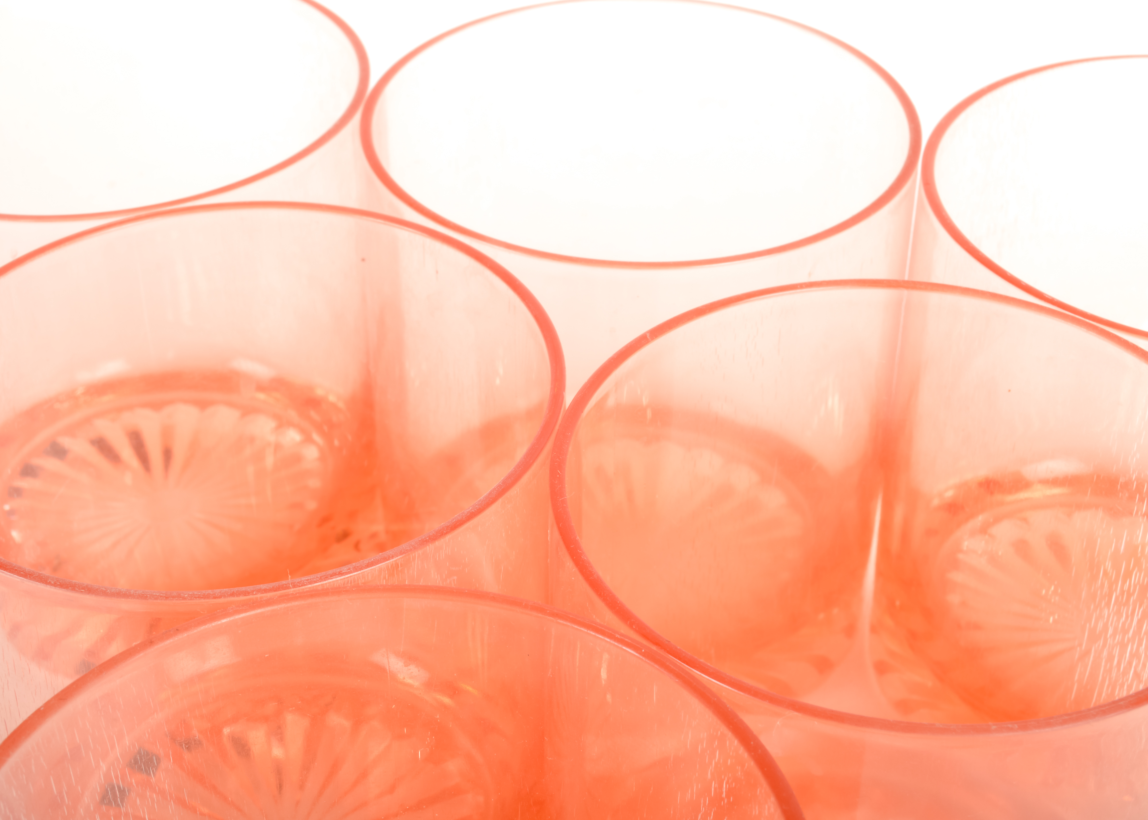 Set of Plastic Cups and a Glass Pitcher