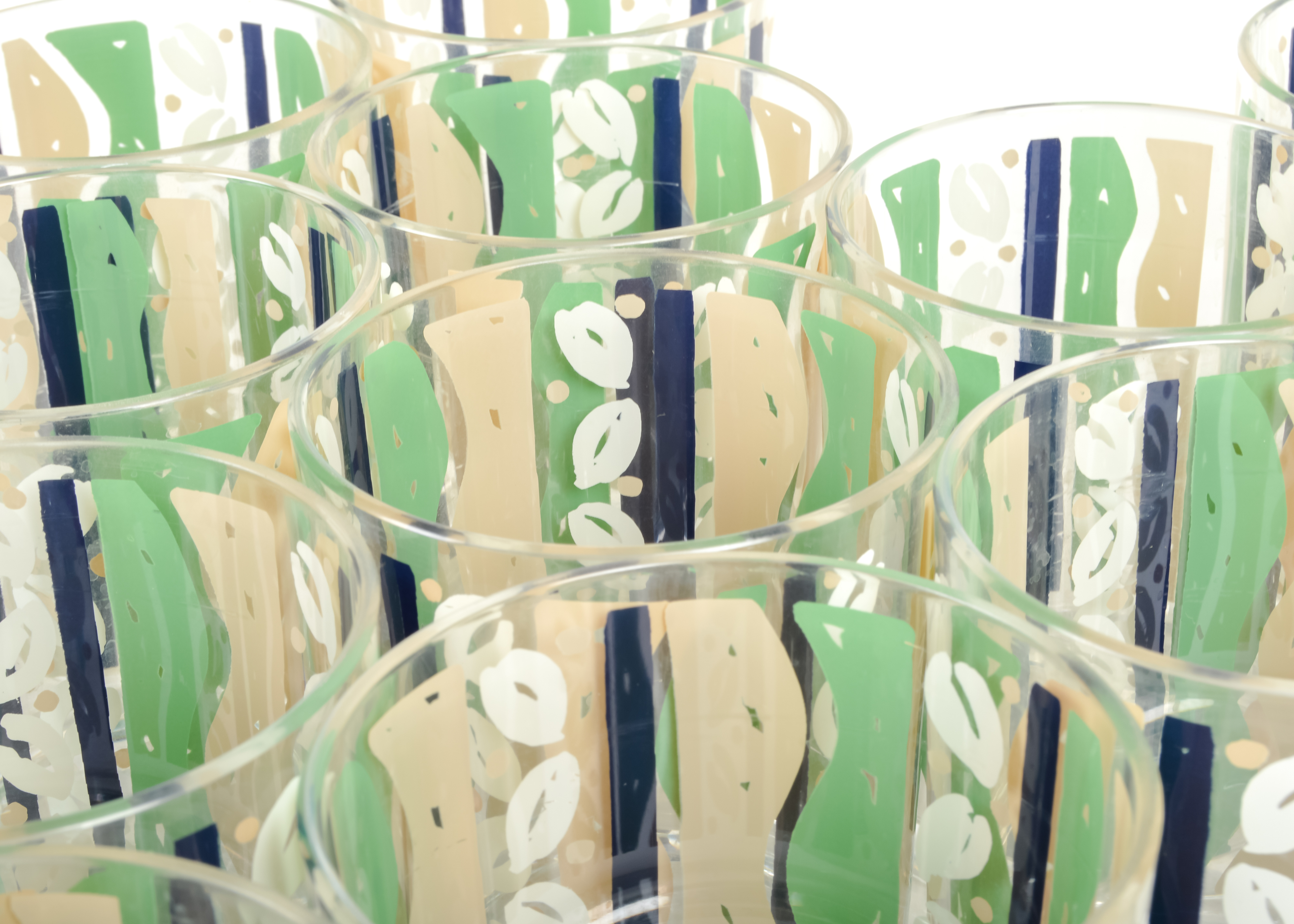 Set of Plastic Cups and a Glass Pitcher