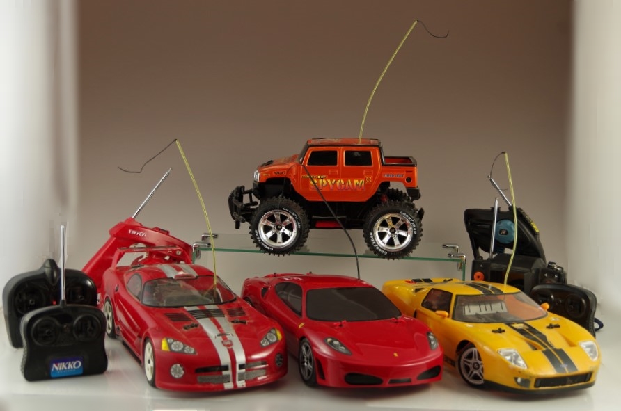 Nikko Radio Controlled Sports Cars and 'Spycam' Hummer Along With Extra Controllers