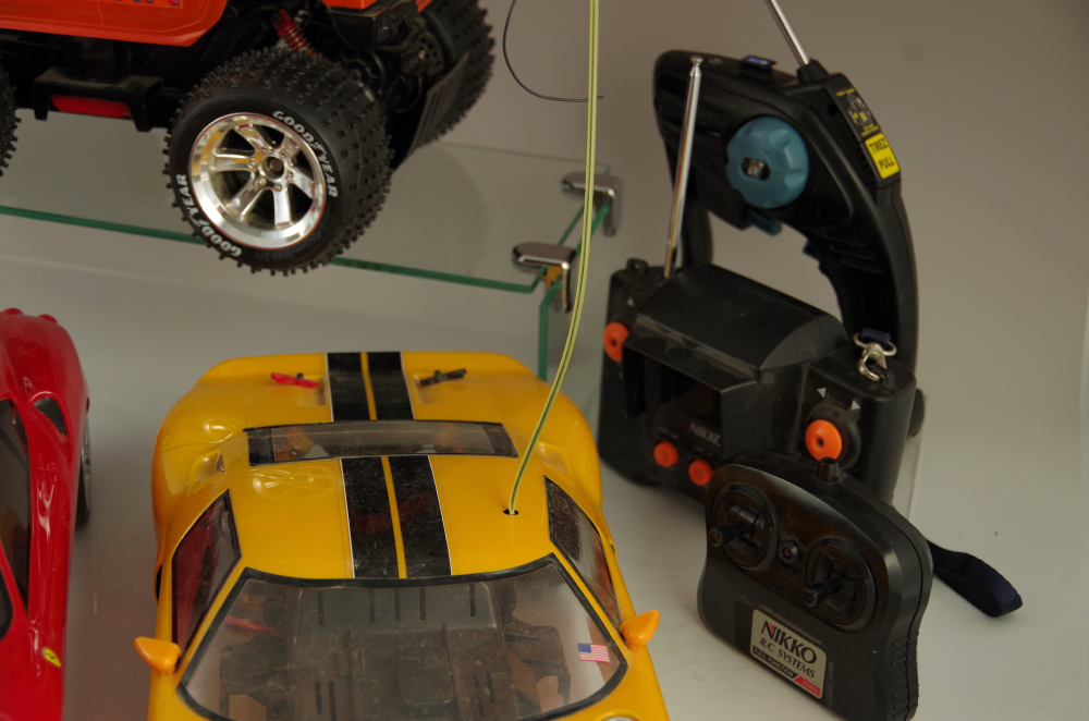 Nikko Radio Controlled Sports Cars and 'Spycam' Hummer Along With Extra Controllers